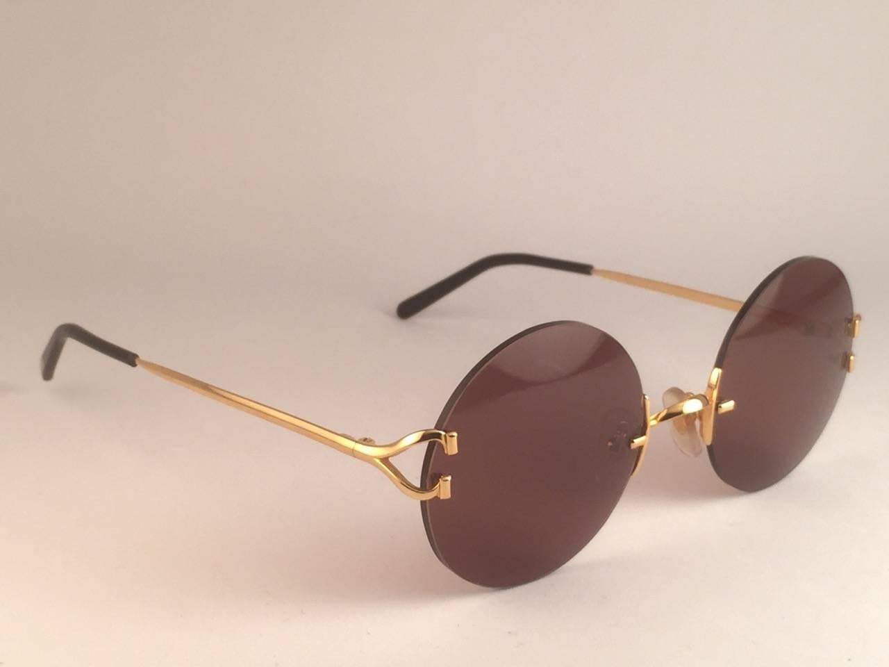 cartier madison round rimless sunglasses