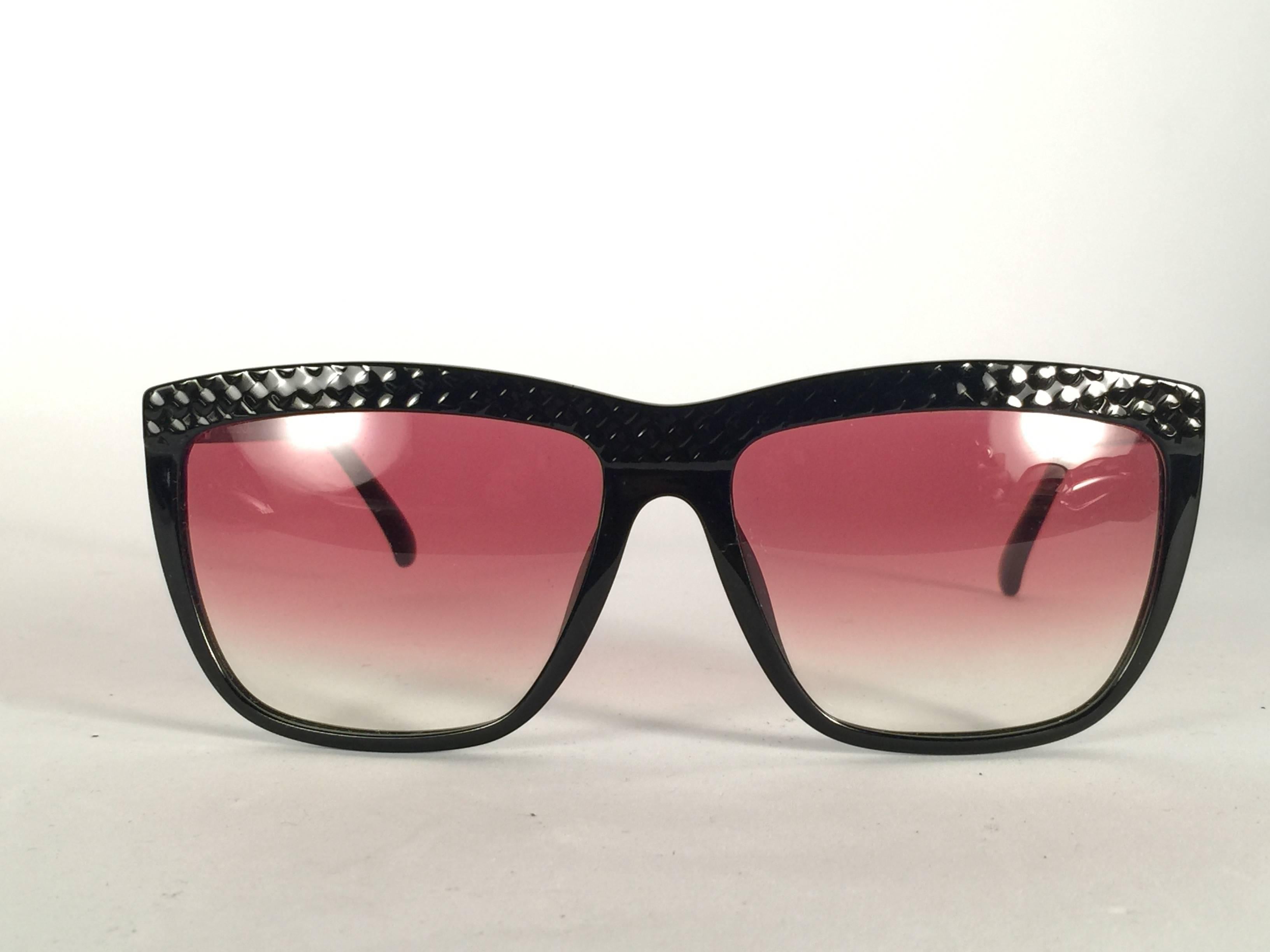 Mint Vintage Christian Dior 2399 Black frame with spotless light gradient lenses.   Made in Germany.  Produced and design in 1970's.  Comes with its original silver Christian Dior Lunettes sleeve.