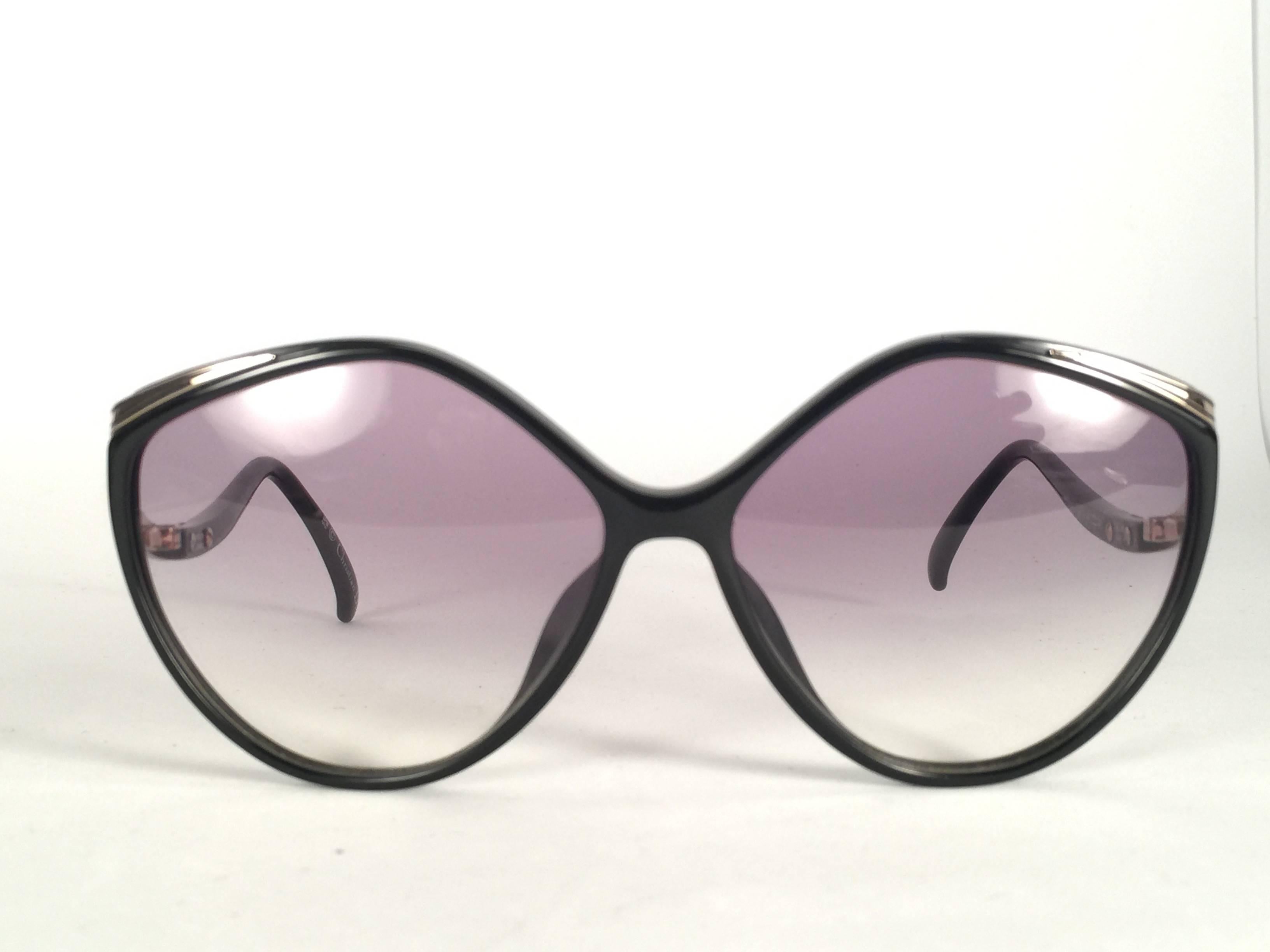Mint Vintage Christian Dior 2280 Black frame with spotless light gradient lenses.   Made in Germany.  Produced and design in 1970's.  Comes with its original silver Christian Dior Lunettes sleeve.