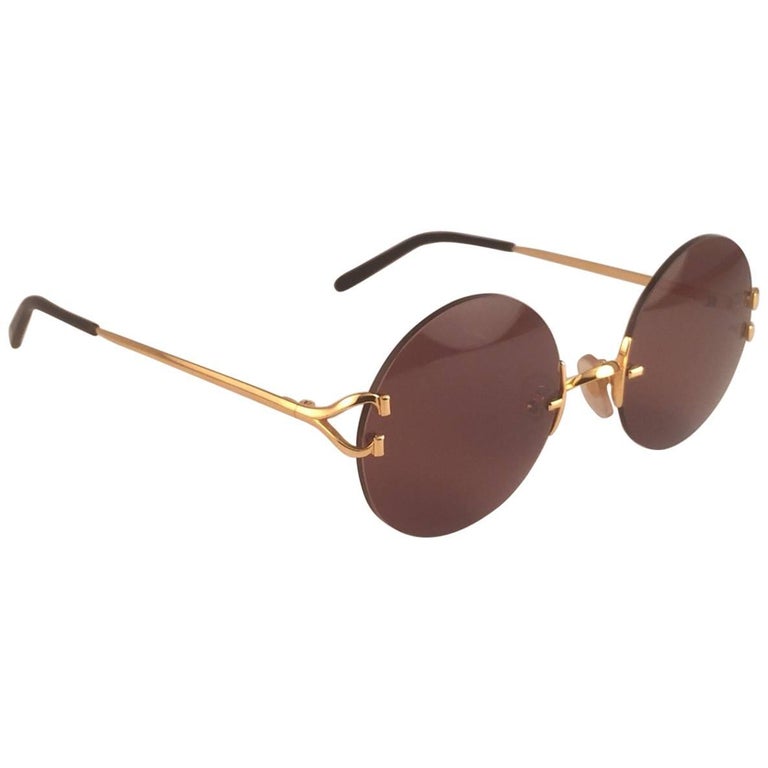 Cartier Madison Round Rimless Gold Brown Lens France Sunglasses at 1stDibs  | cartier madison sunglasses, lens france brown, cartier madison glasses