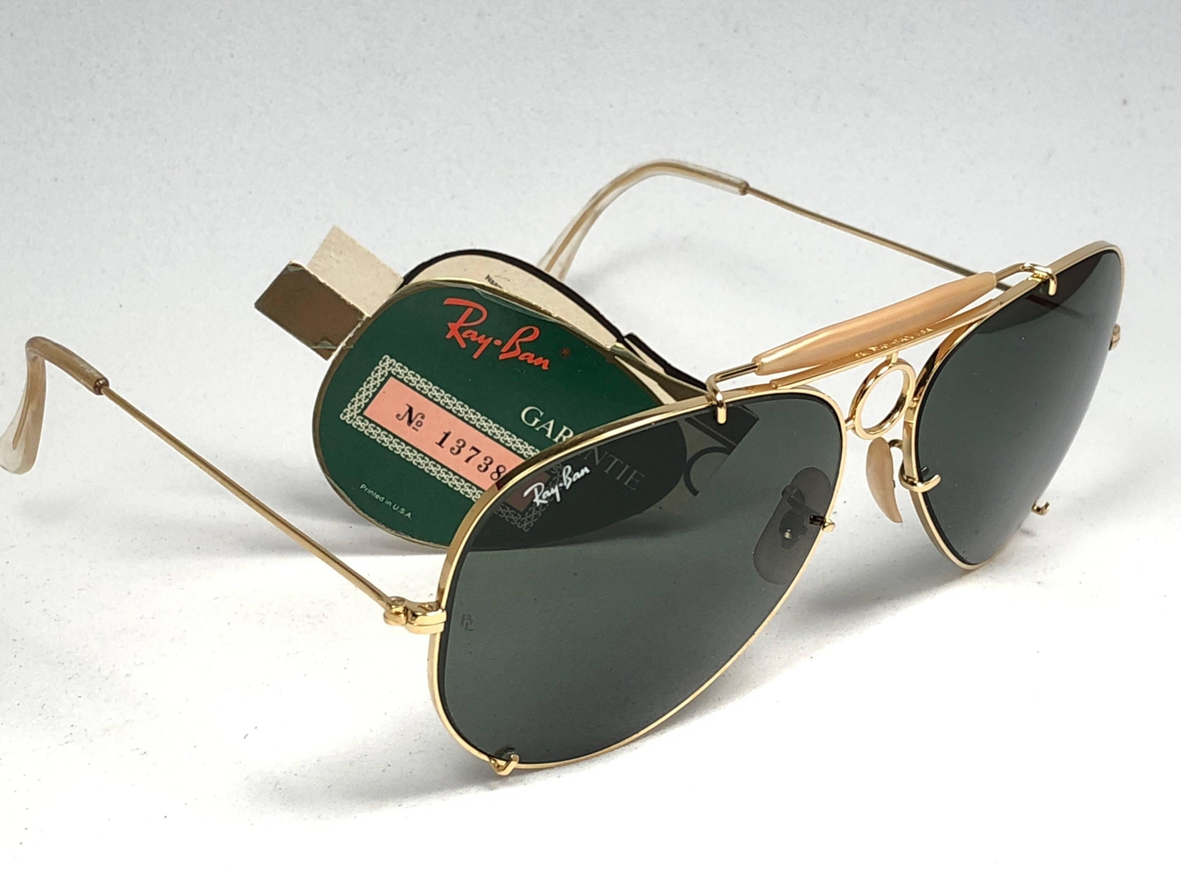 New Vintage Ray Ban Sharpshooter 62mm. B&L etched in both G15 Grey lenses.  
Comes with its original Ray Ban B&L case. This pair may show minor sign of wear due to nearly 40 years of storage.
A seldom piece in never worn or displayed condition.