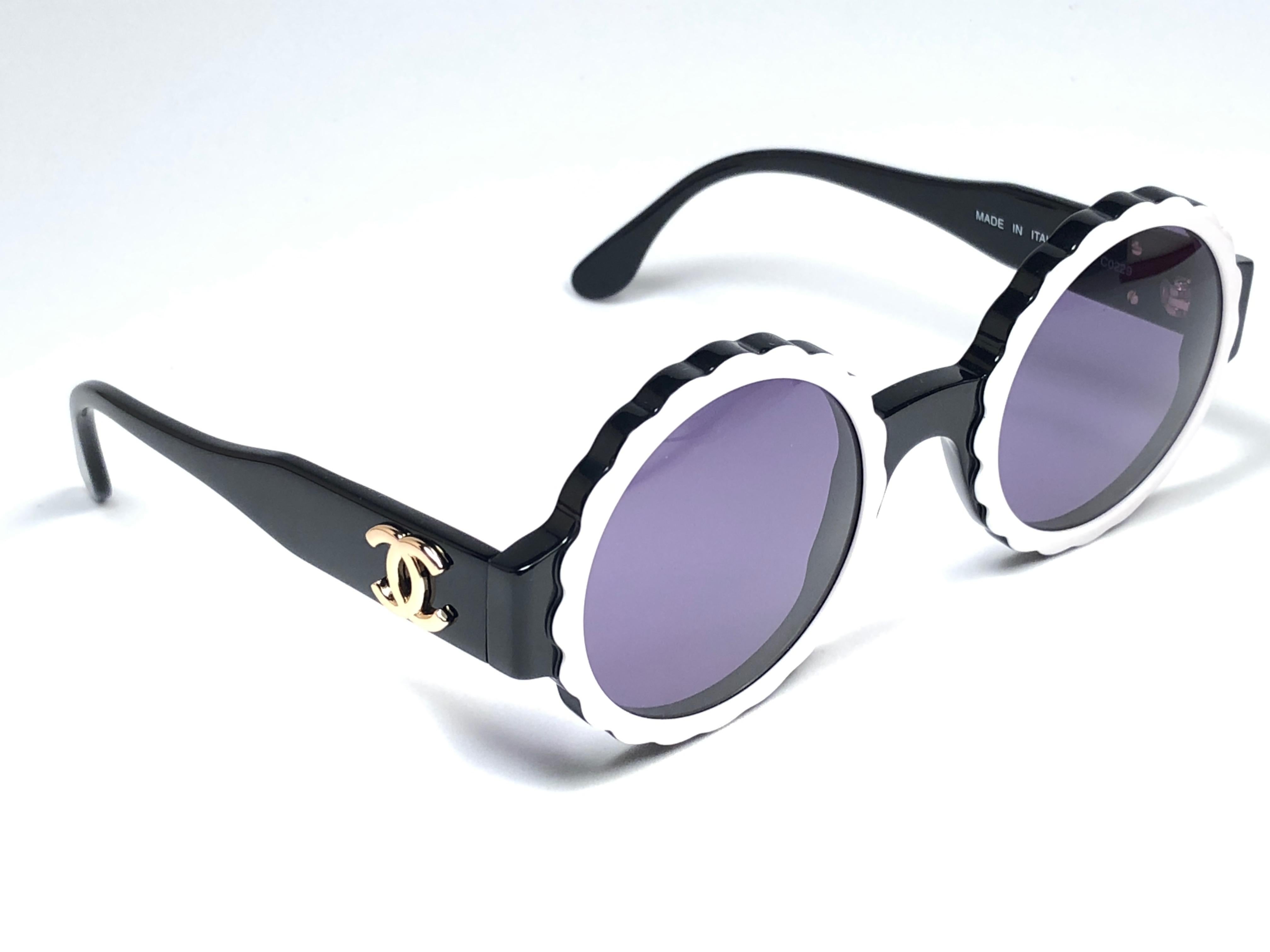 New Rare Vintage Chanel Spring Summer 1993 sunglasses.

A seldom and unique piece in this new, never displayed or worn condition.

This pair of Chanel sunglasses is an absolute showstopper.

This pair may show minor sign of wear due to storage.