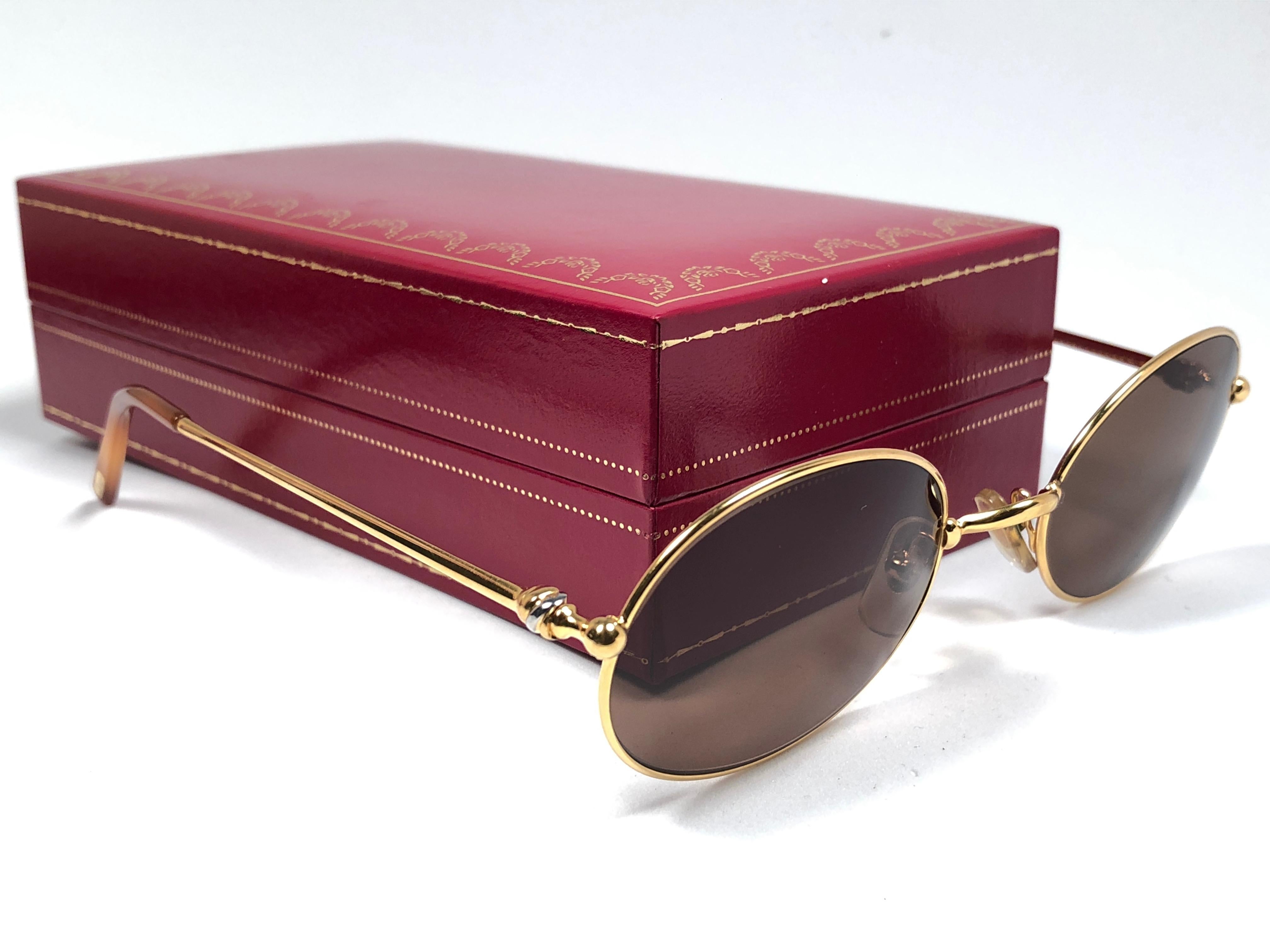 Vintage Cartier Saturne Gold Plated Solid Brown Lens France 1990 Sunglasse In New Condition In Baleares, Baleares