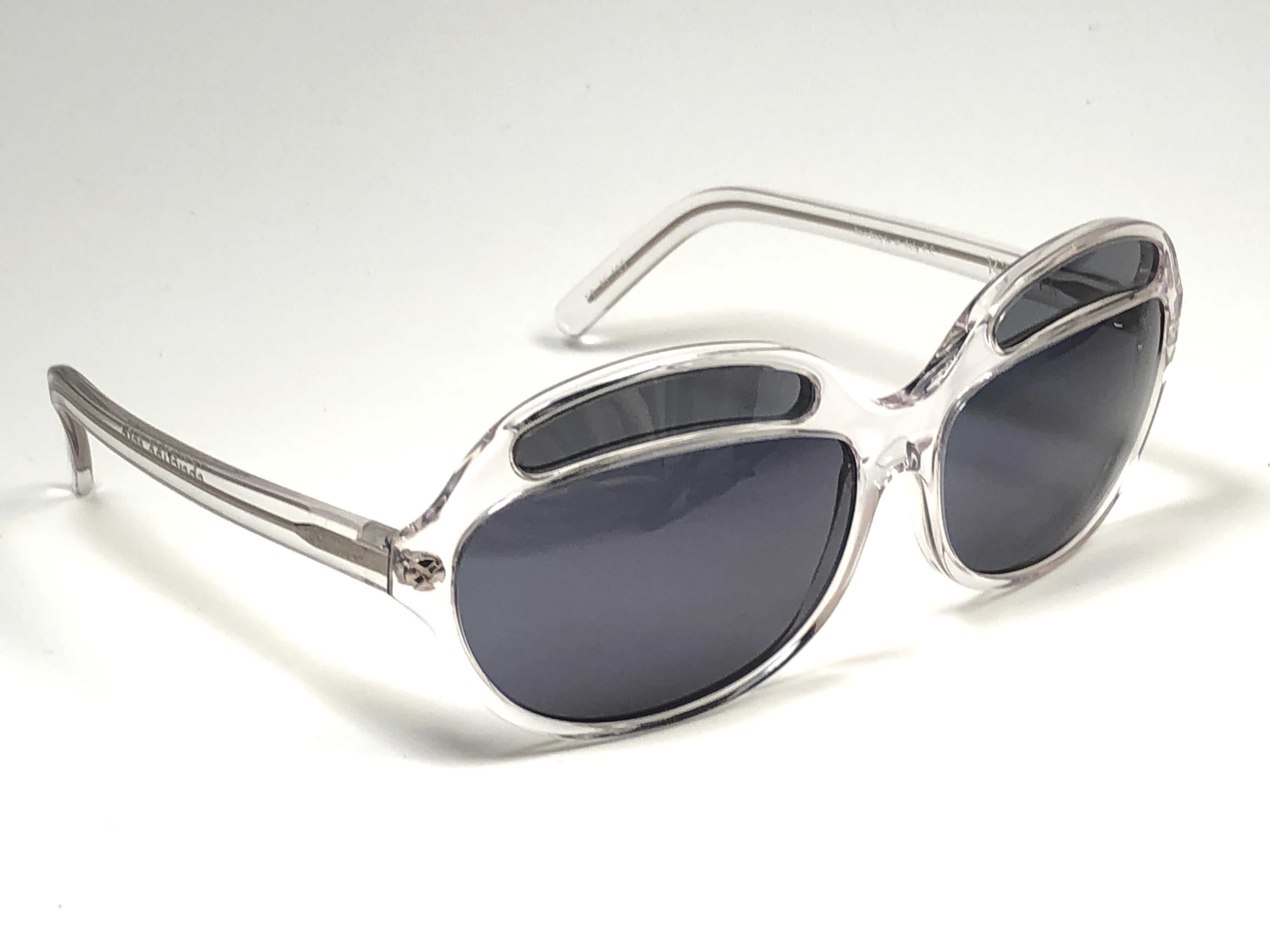 New Vintage Christian Roth translucent bug eyed. Spotless grey lenses.

New, never worn or displayed this pair may show minor sign of wear due to storage.

Handmade in Italy.