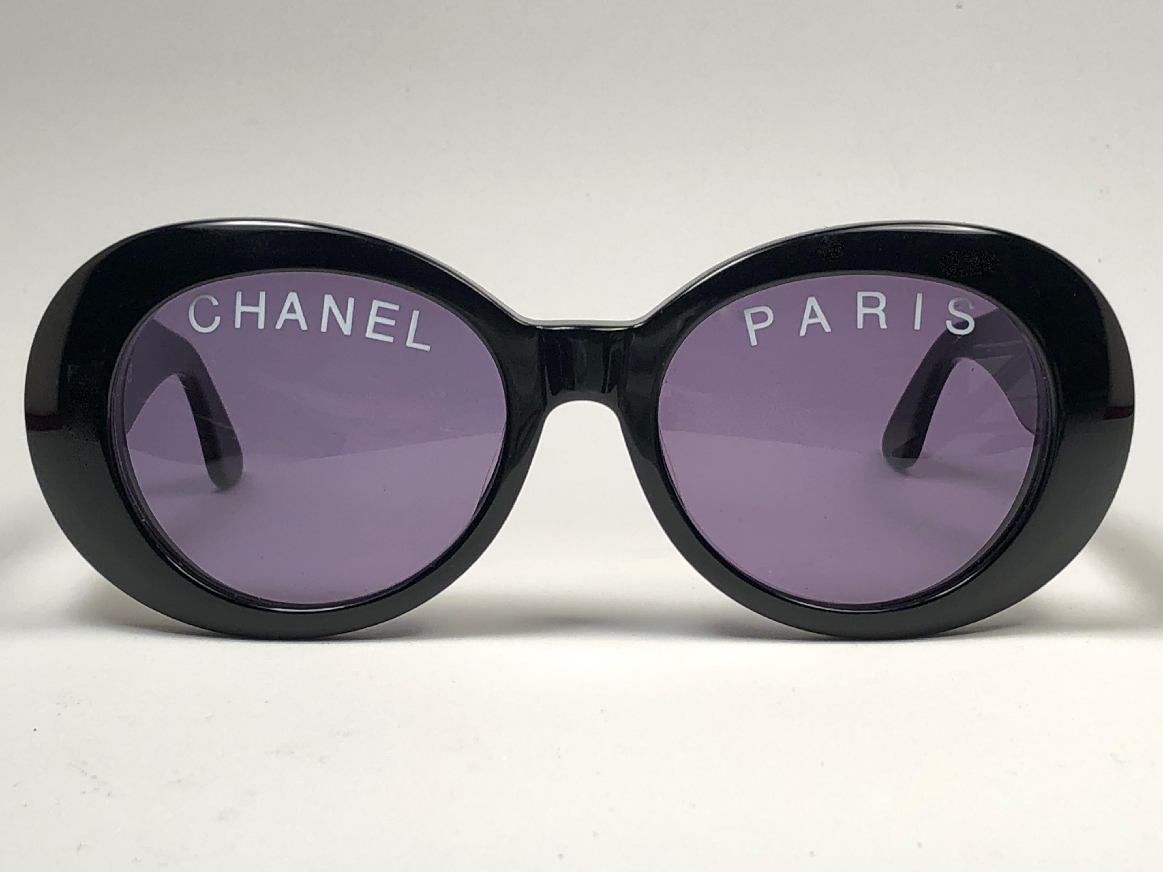 New Rare Chanel sunglasses form the collection Spring Summer 1993.

A seldom and unique piece in this new, never displayed or worn condition.

This pair of Chanel sunglasses is an absolute showstopper.

This pair may show minor sign of wear due to