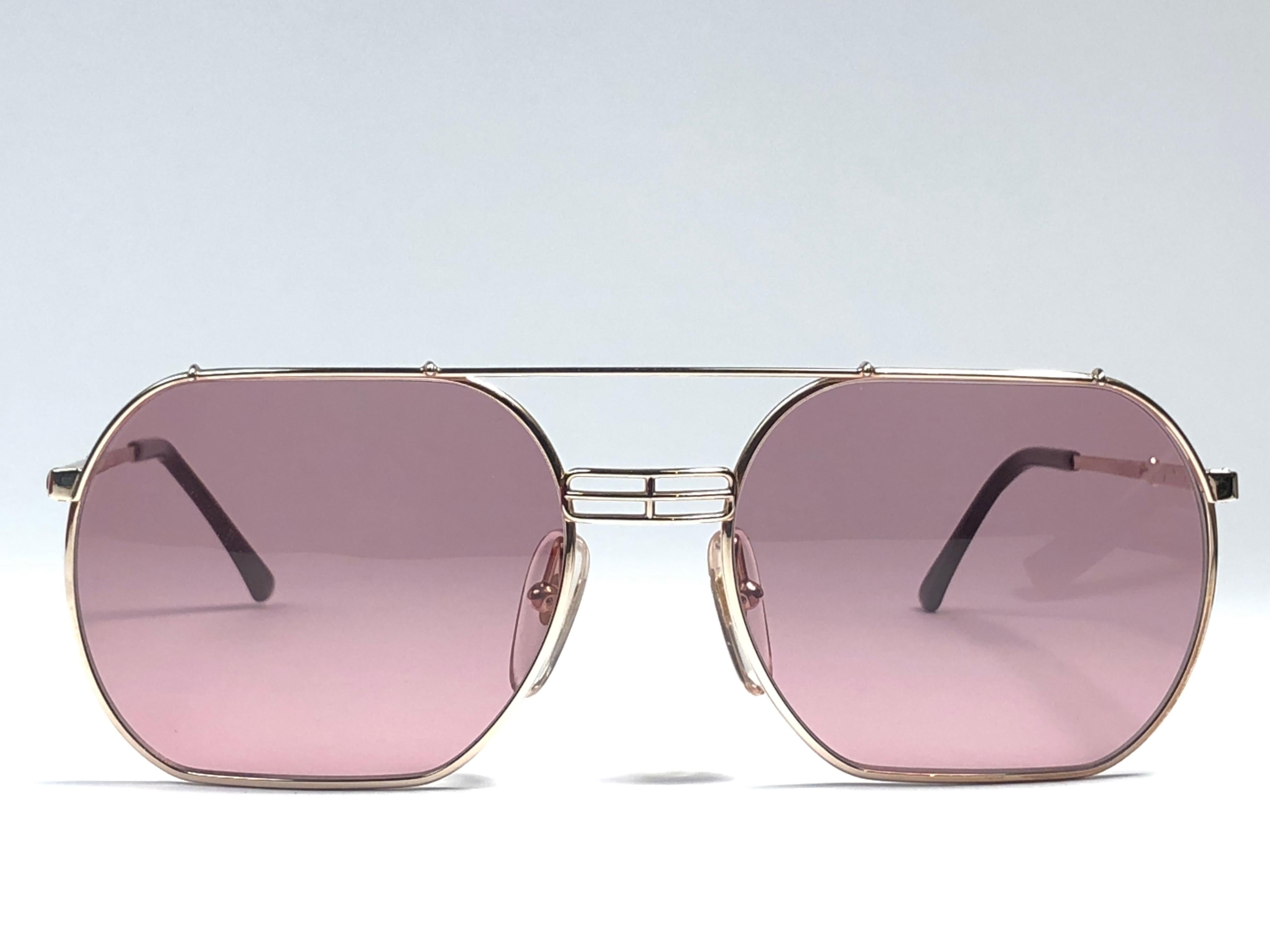 New vintage Christian Dior Monsieur Silver 2363 sunglasses. .

Spotless medium rose lenses.

Comes with it original CD Monsieur sleeve.

New, never worn or displayed this item may show light sign of wear due to storage.

Made in Austria