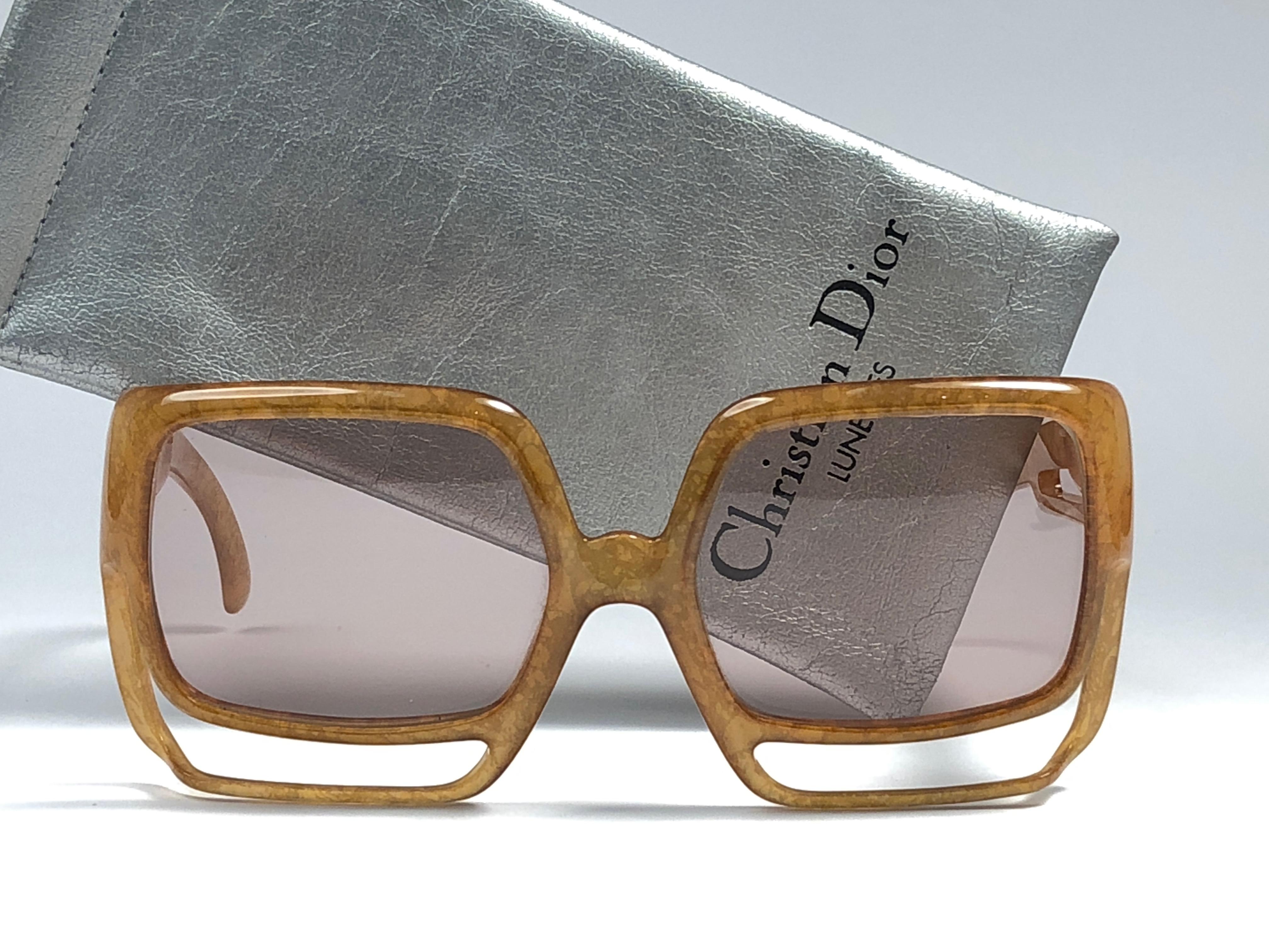 New Vintage Christian Dior 2029 10 light amber jasped frame sporting light gradient lenses. 

Made in Germany.
 
Produced and design in 1970's.

A collector’s piece!

New, never worn or displayed. Comes with its original silver Christian Dior