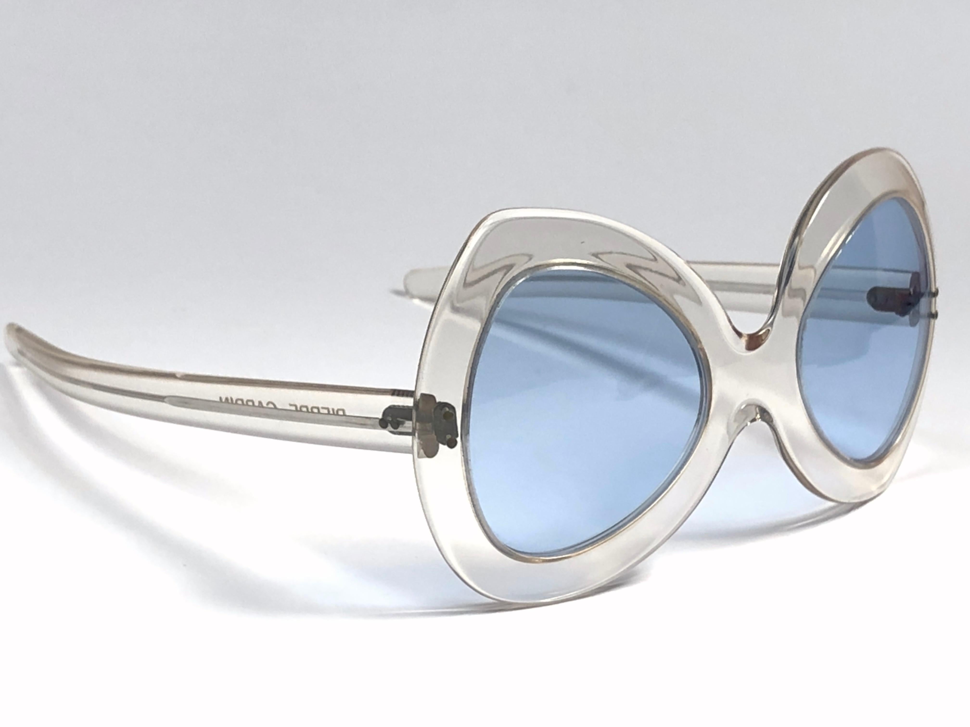 Vintage new Pierre Cardin Oversized translucent frame sporting a pair of bluelenses. Designed and produced in the 1960’s.   

This pair of vintage Pierre Cardin is a collectors must have. A piece of sunglasses and fashion history.

This frame is in