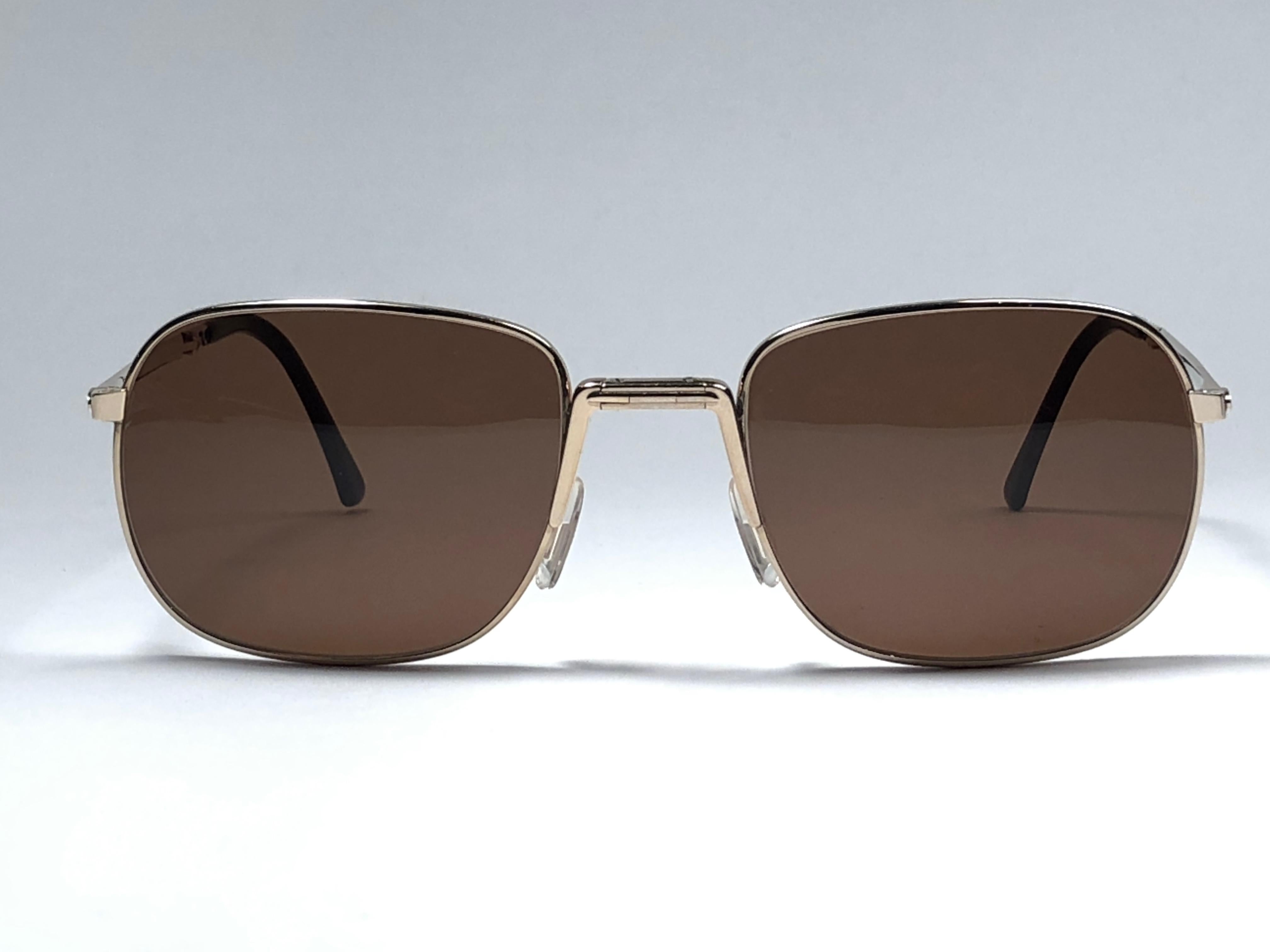 New vintage Christian Dior Monsieur folding sunglasses. .

Spotless brown gradient lenses.

Comes with it original CD Monsieur sleeve.

New, never worn or displayed this item may show light sign of wear due to storage.

Made in Austria