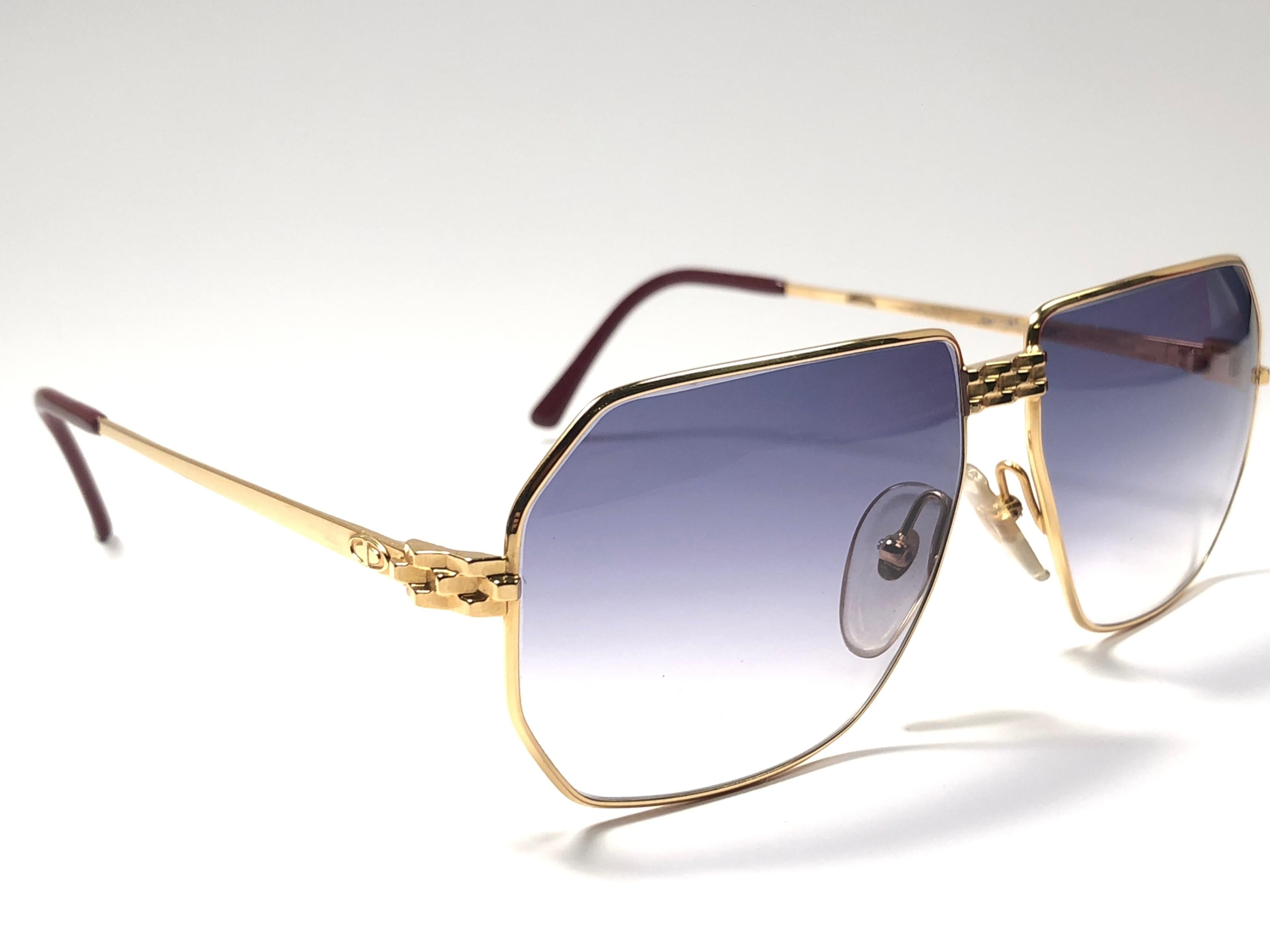 New vintage Christian Dior Monsieur gold details.

Spotless blue gradient lenses.

Comes with it original CD Monsieur sleeve.

New, never worn or displayed this item may show light sign of wear due to storage.

Made in Austria