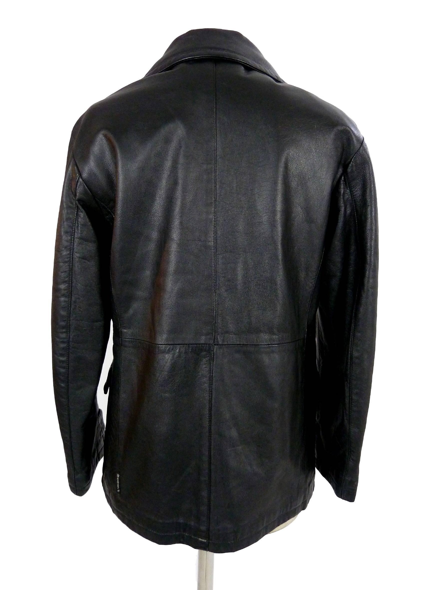 Giorgio Armani vintage 1990s 100% leather women's jacket, double breasted slim fit peacot.

Size: 40 IT 6 US 8 UK

Shoulders: 43 cm 
Bust/Chest: 50 cm 
Sleeves: 58 cm 
Length: 74 cm 

Composition: 100% genuine leather 
Colour: black 
Condition:
