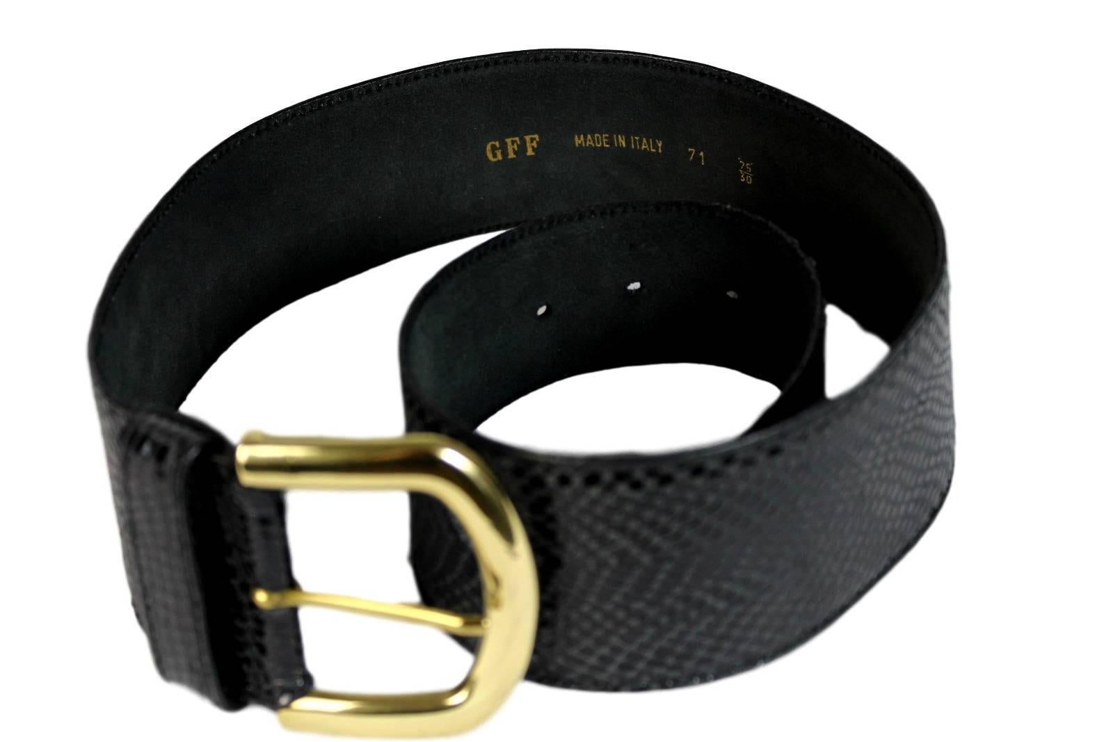 Gianfranco Ferre belt vintage 1980s snakeskin, black buckle golden. The belt has a flared shape, it is not linear, for a better fit. Excellent vintage. conditions. Size 75/30

Fabrication: Snakeskin
Meausurements
Lenght: 85 cm
Width: 6