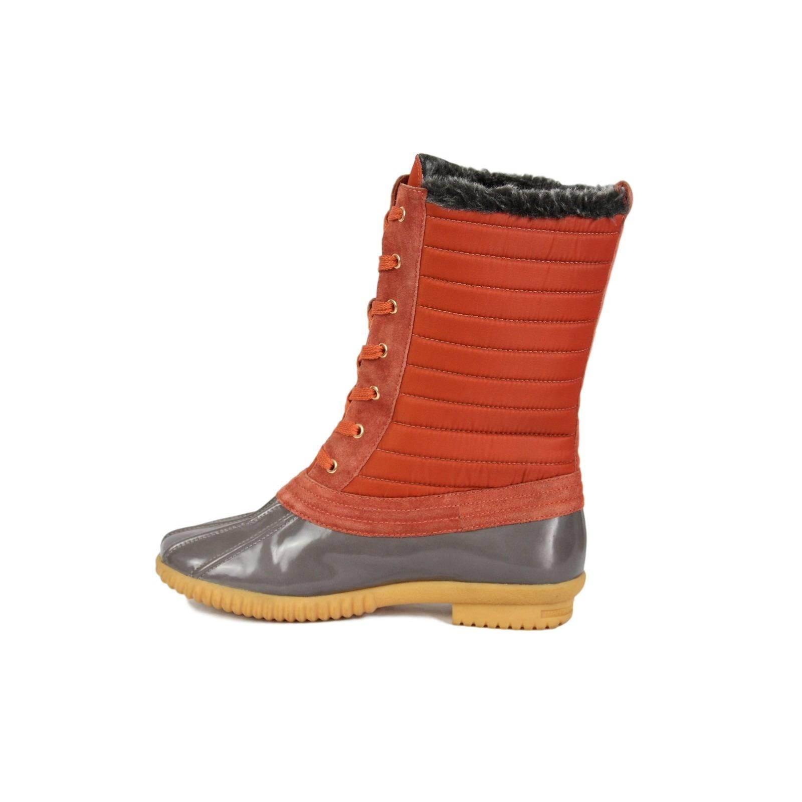 The Marc by Marc Jacobs duck boot belongs in every woman’s closet, especially for those still experiencing a little cold weather. I know singer Christina Aguilera is a fan. This rubber round toe duck boot features a nylon lace up front, shearling