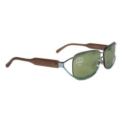 Nina Ricci vintage sunglasses NR 3477 green brown polycarbonate 1980s women’s
