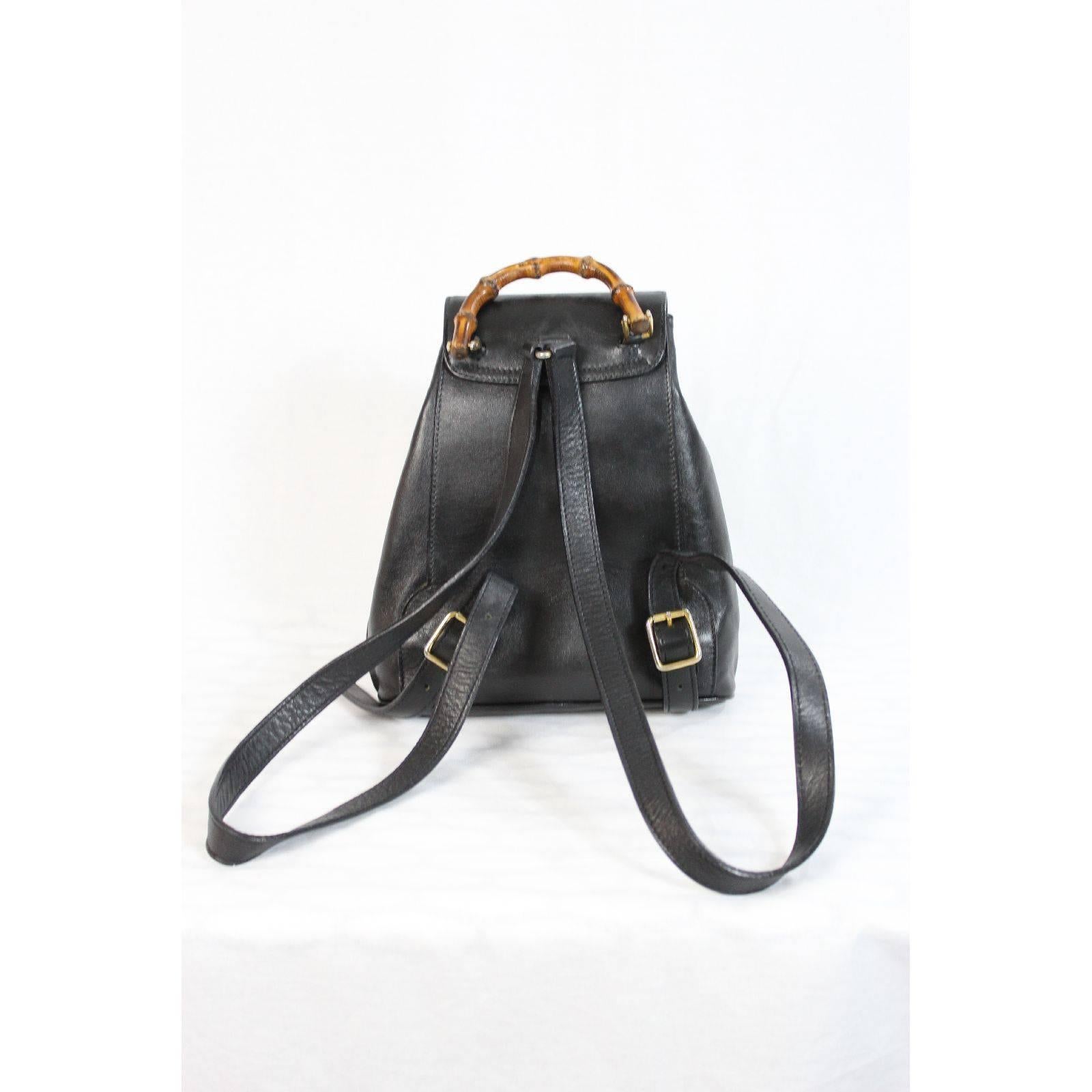 Gucci bamboo vintage black leather backpack bag serial code with pocket In Excellent Condition For Sale In Brindisi, IT