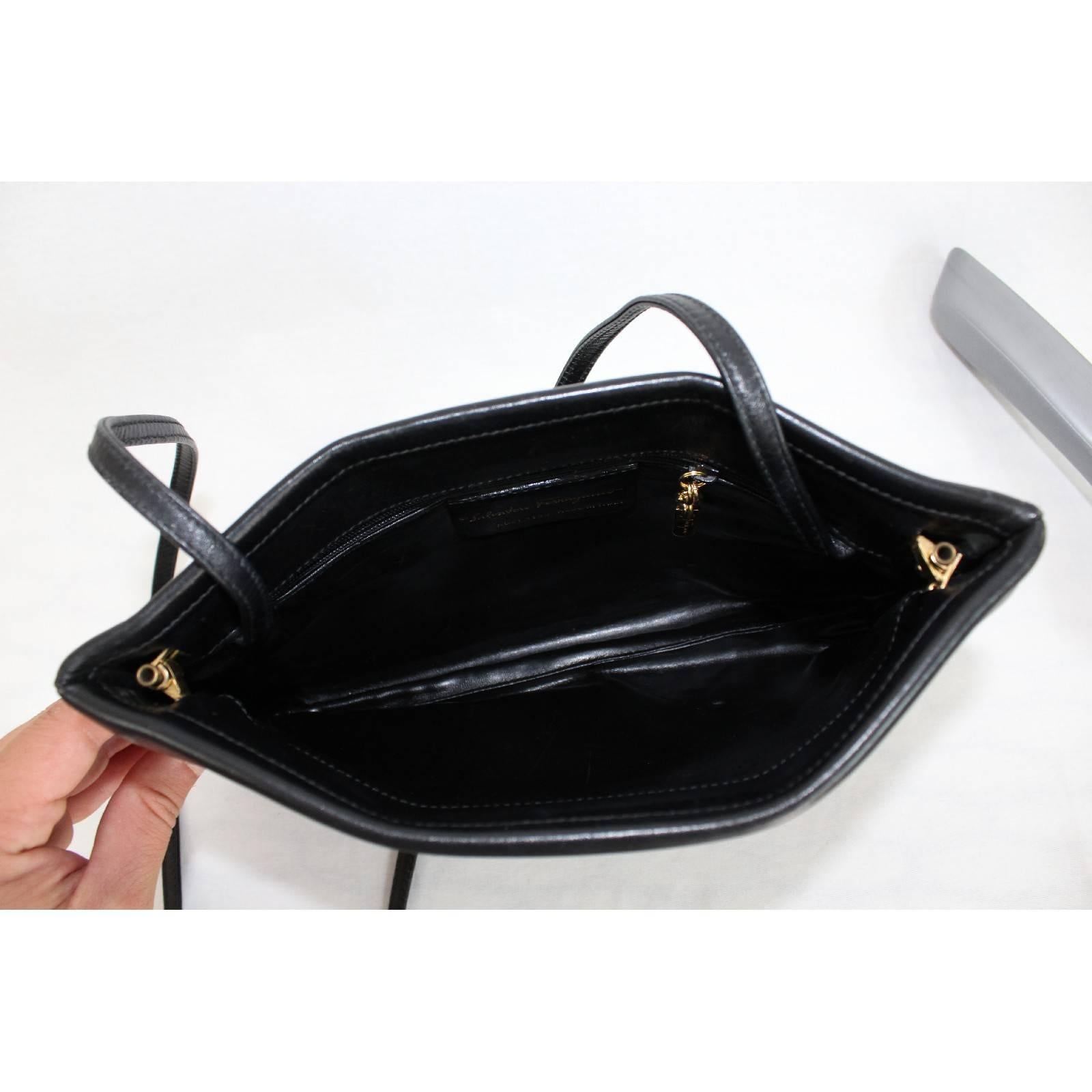 Salvatore Ferragamo black leather clutch bag cod. ad 211183 made italy 1980s 1