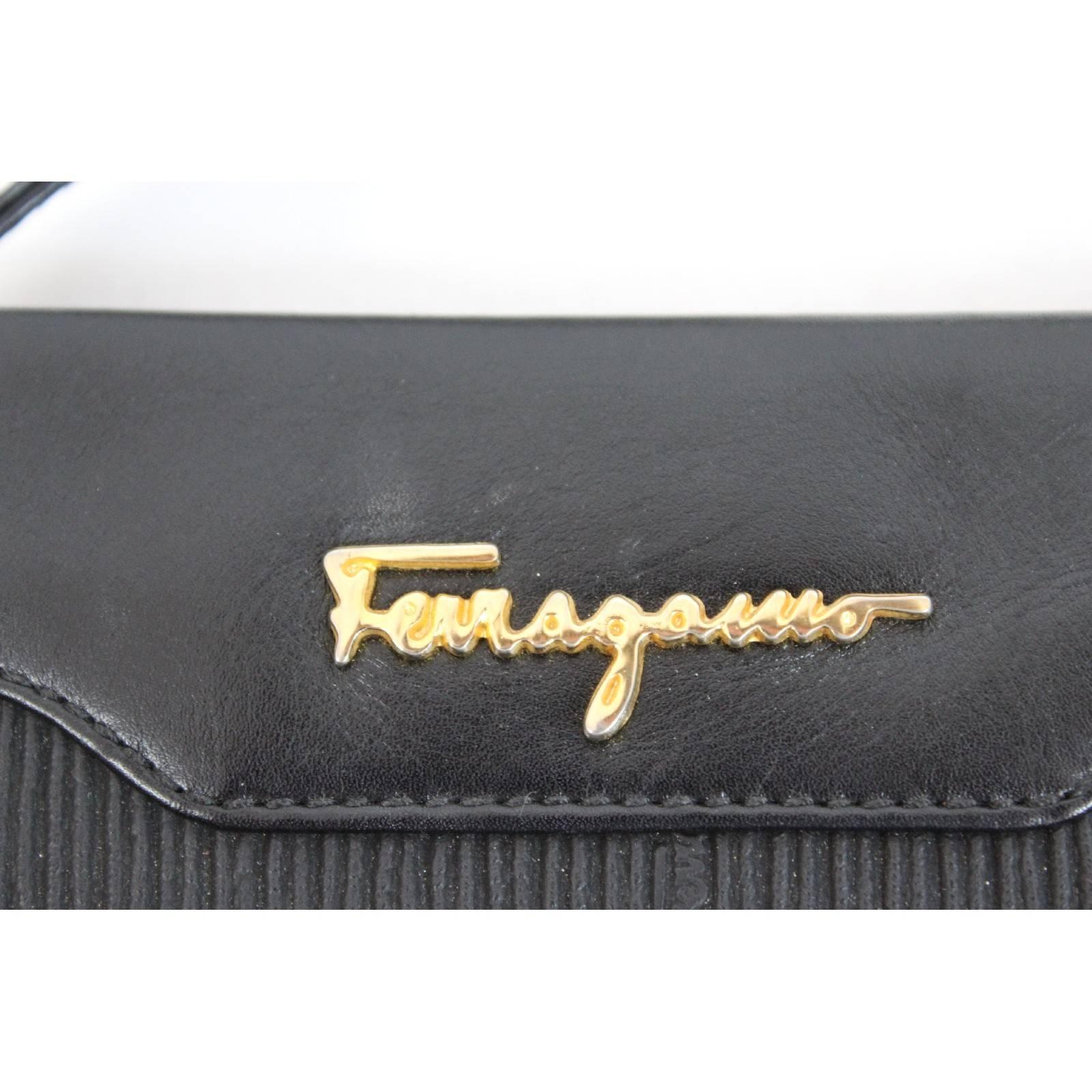 Salvatore Ferragamo black leather clutch bag cod. ad 211183 made italy 1980s 4