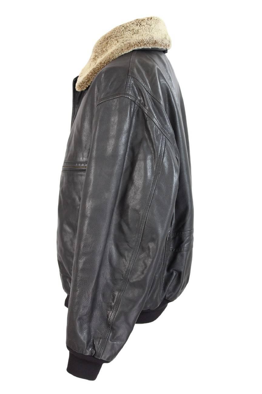 Aquascutum vintage black leather jacket, aviator model, fur-knit button closure, fantasy club check inside, zip closure and buttons, two pockets on the chest with zip and two on the hips. Excellent conditions.
The size label is not present, but by