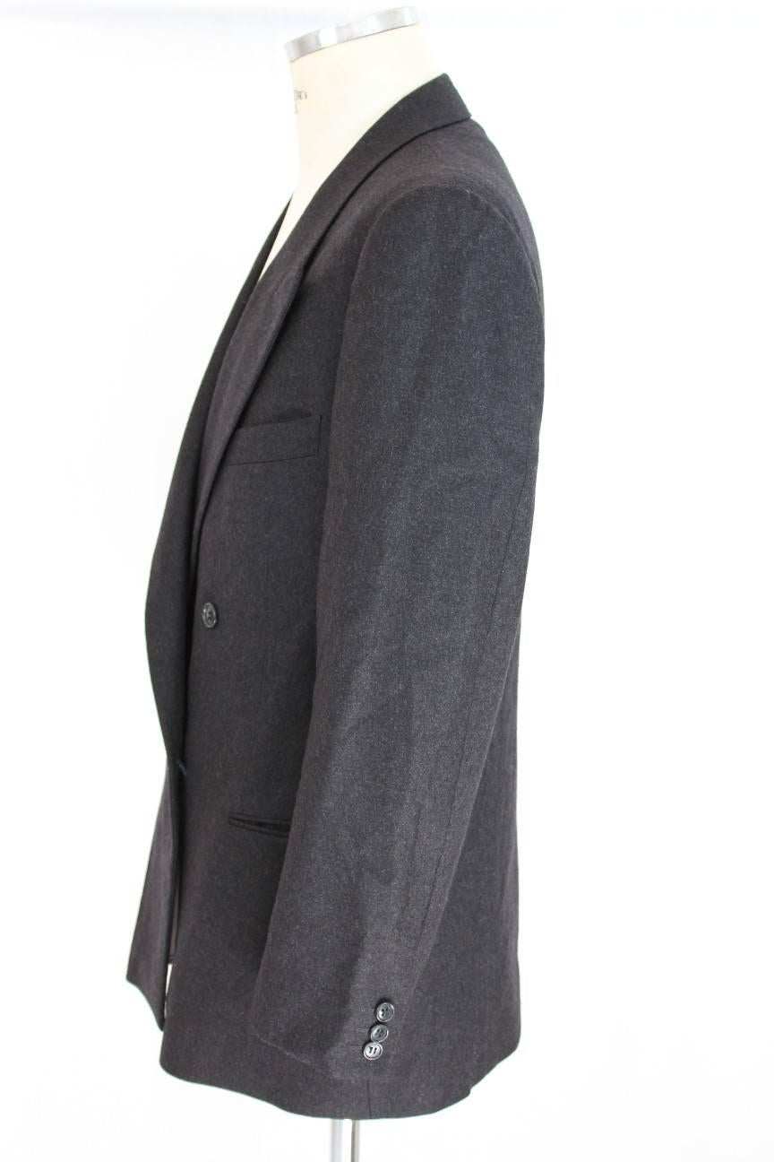 Giorgio Armani dark gray double breasted wool jacket, excellent condition. The size label is not present, but by the measures in cm we can say it is a 46 it.

Size: 46 It 36 Us 36 Uk

Shoulder: 46 cm
Armpit to Armpit: 53 cm
Sleeve: 64 cm
Length: 86