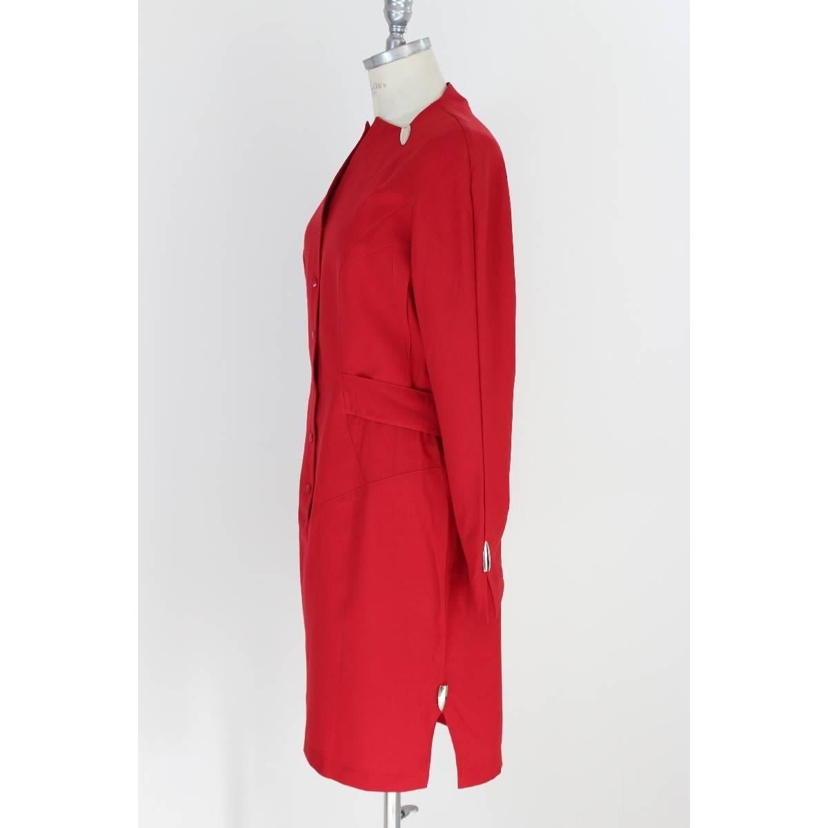 Thierry Mugler Paris 100% wool red vintage dress , the dress closes along the chest with clips, pencil skirt, the sleeves are wide at the end, on the neck and at the end of the sleeves there are steel inserts, there is a belt on the shoulder,