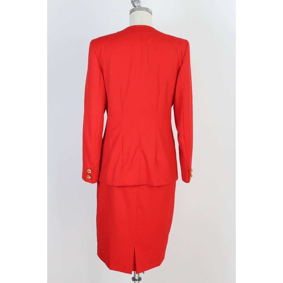 Valentino miss V vintage red women’s skirt suit. Beautiful red Valentino. The jacket slim fit with four pockets. Golden buttons with logo. Fully lined jacket and skirt. Size 44 made in italy, new with label.

Size: 44 IT 10 US 12 UK

Shoulder: 44