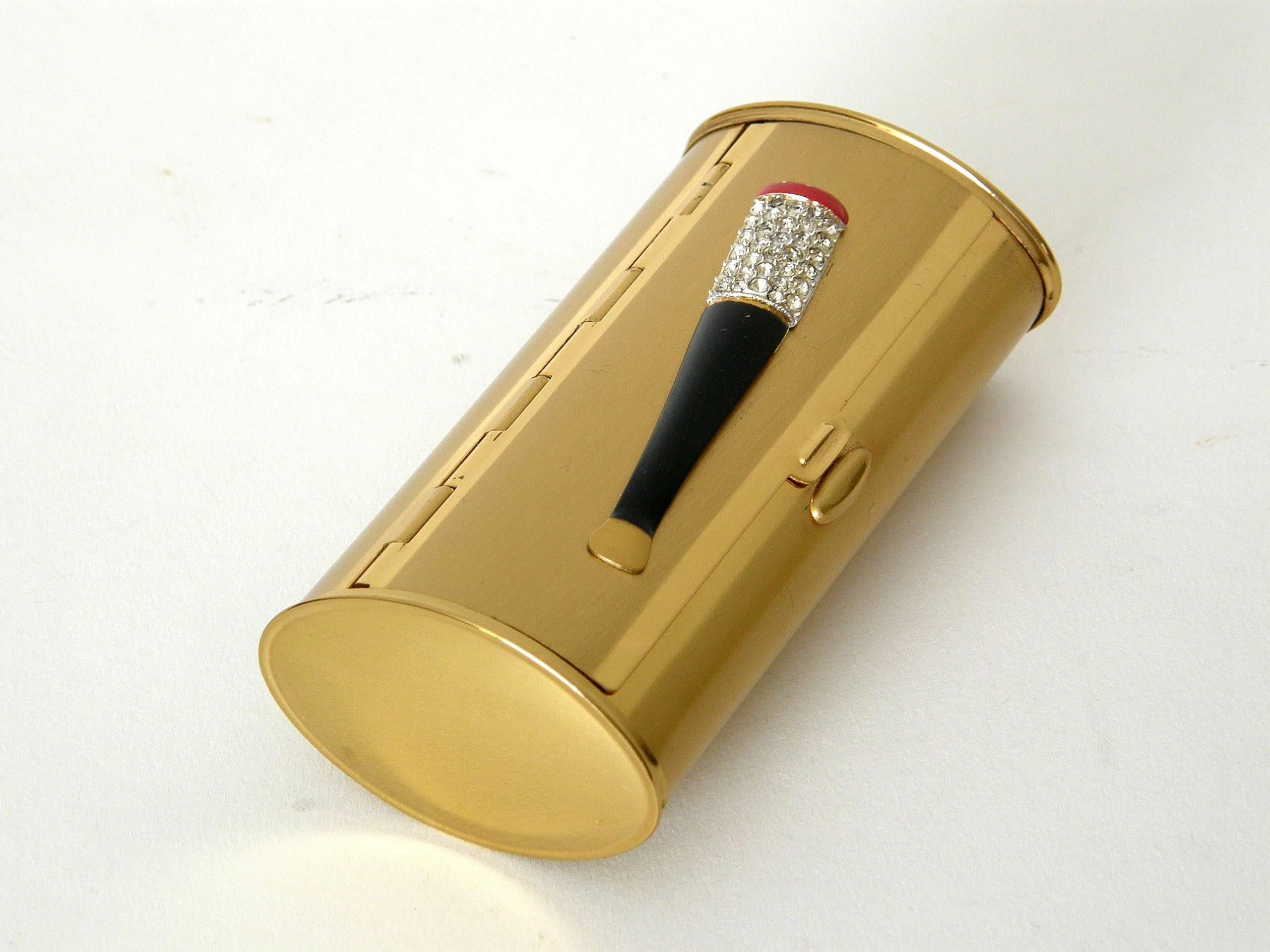 This cigarette case is a wonderful novelty accessory. It has a glamorous, bejeweled 