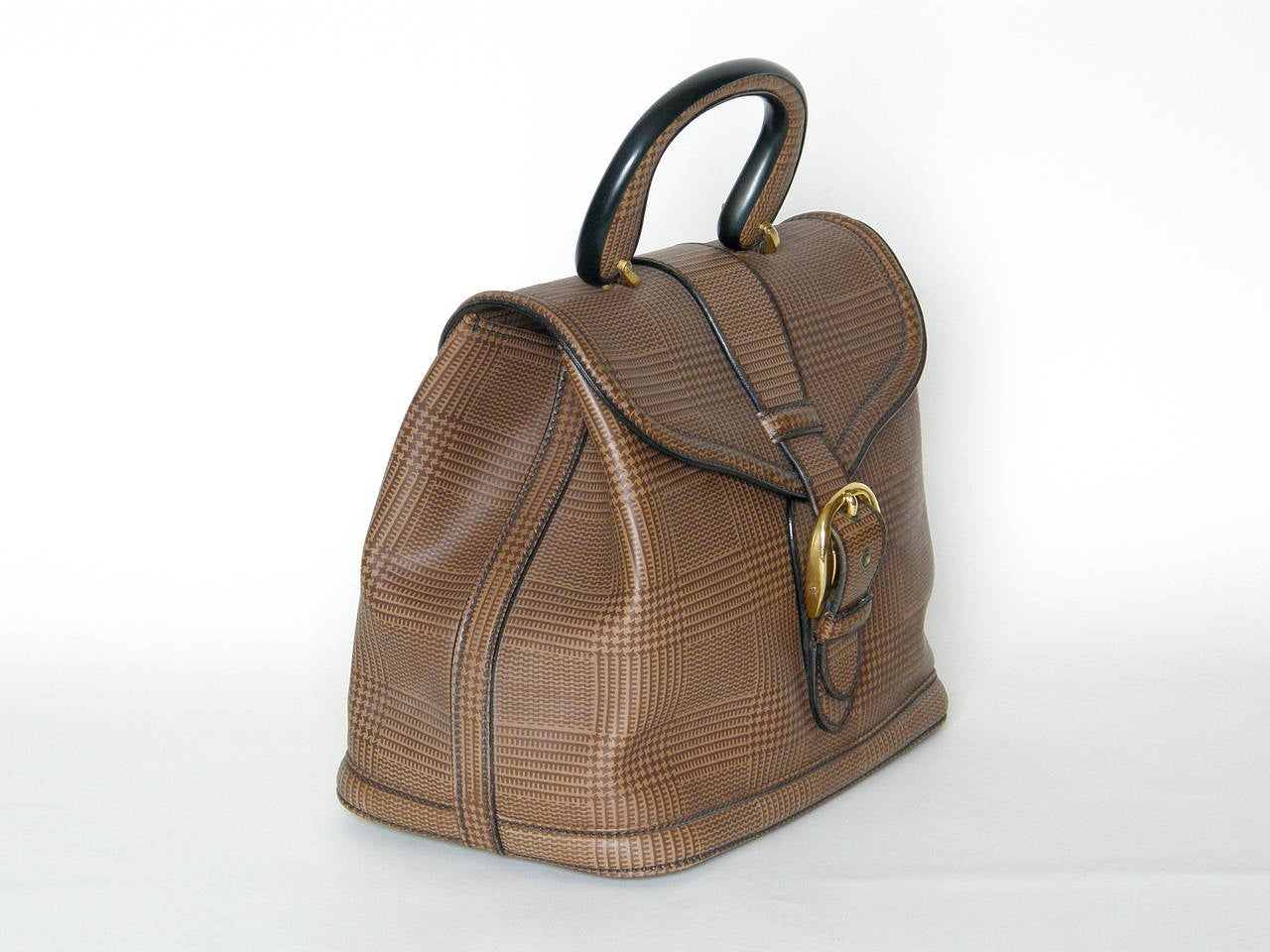 Oversized Italian leather handbag with a printed plaid pattern. This roomy bag has a flap top with a rigid handle and a locking, gold-plated buckle clasp. The suede lined interior has one zippered and two slip pockets, one with a matching suede coin