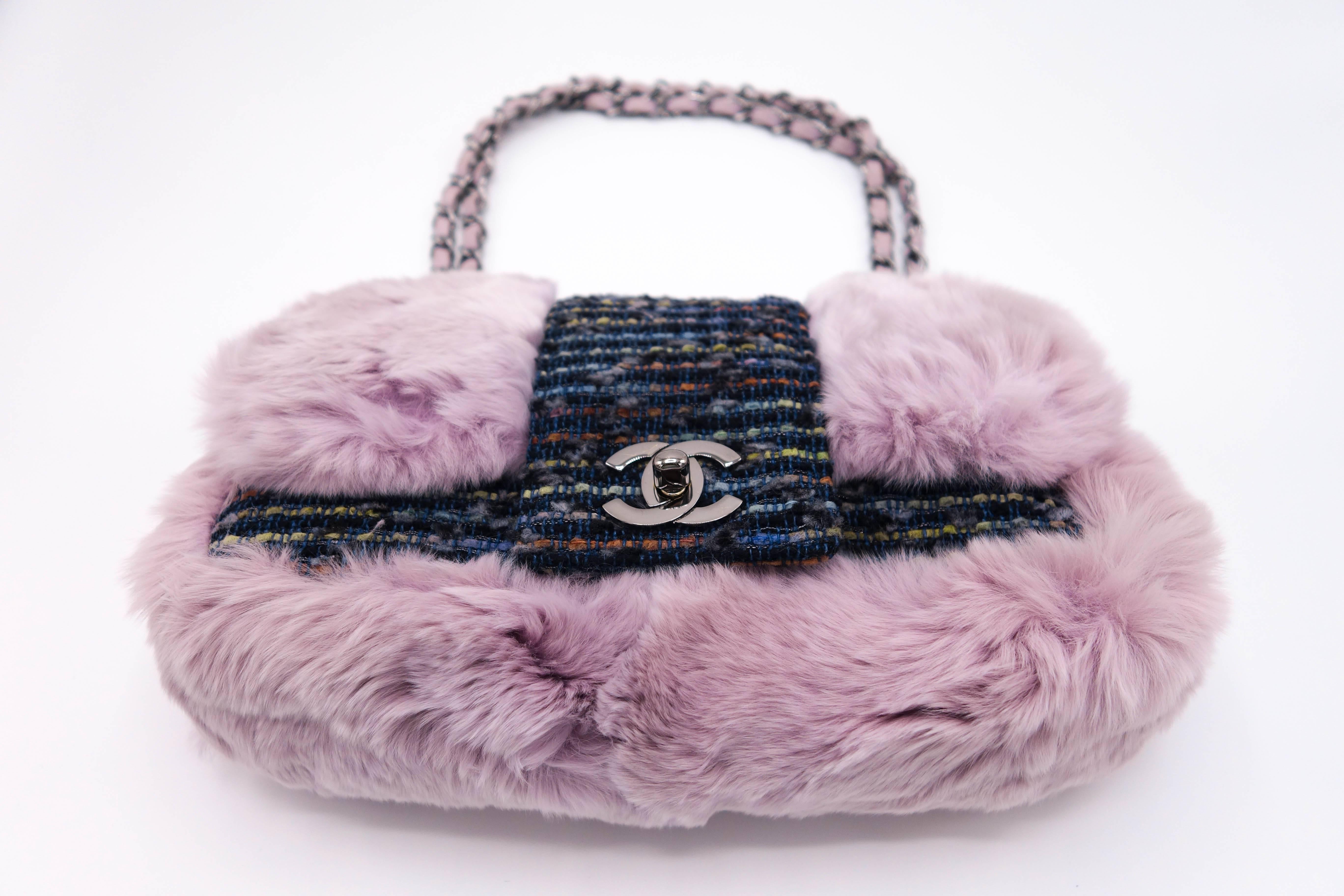 Brand new beautiful and rare Chanel glicine lapin & tweed single flap purple fur bag. The fur is extremely soft. Shoulder strap measures 9"L. Must have for your winter wardrobe. 

Comes with authenticity card, dustbag and box. 