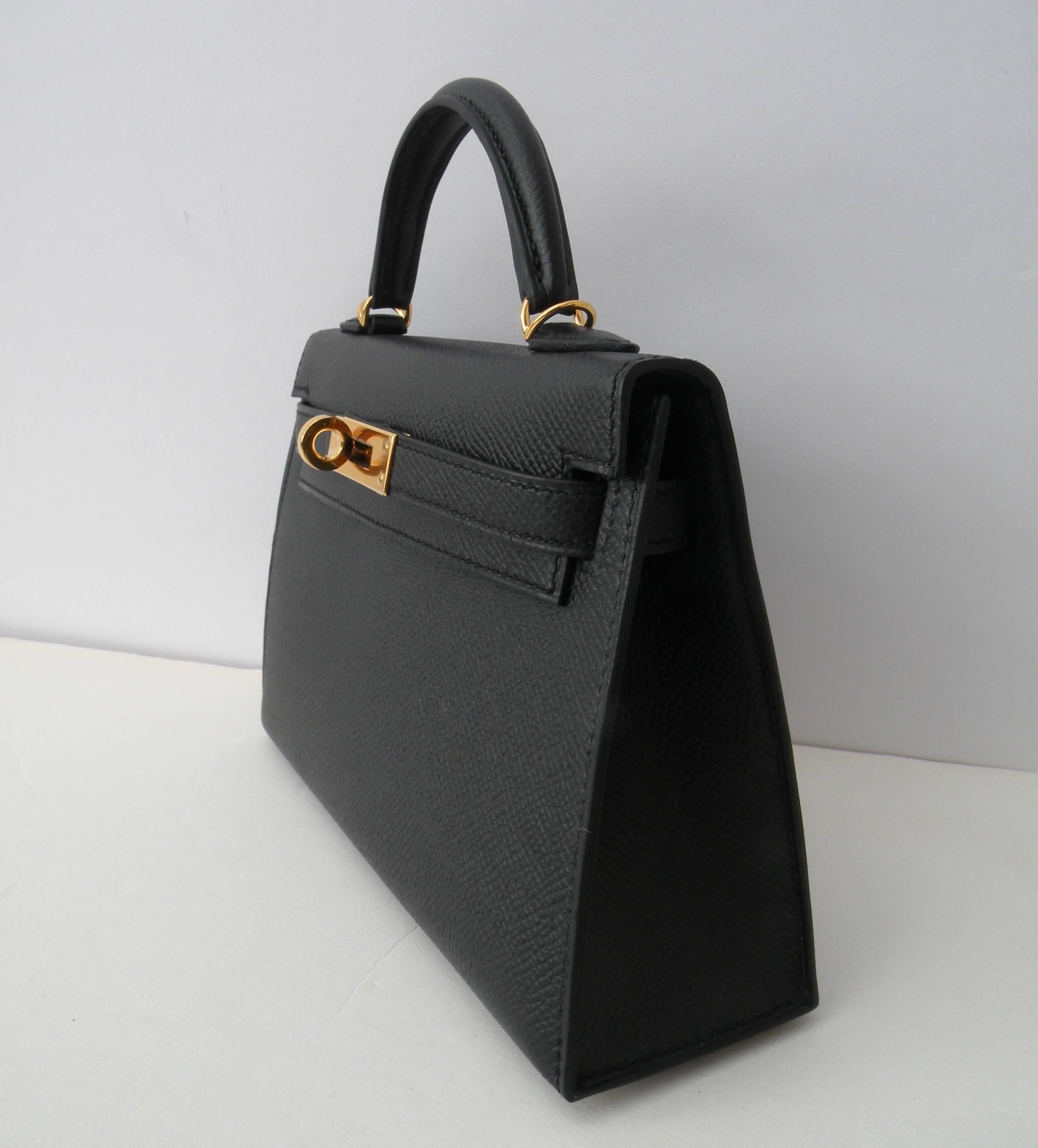 Hermes Mini Kelly Bag 
Size: 20cm
Color: Black
Leather: Epsom
Hardware: Gold

Hermes Kelly Bag done in 20cm, a new size and shape just introduced from Hermes.  It quickly sold out to their VIP clients!
Very Rare,  a Collectors Item!
You cant go