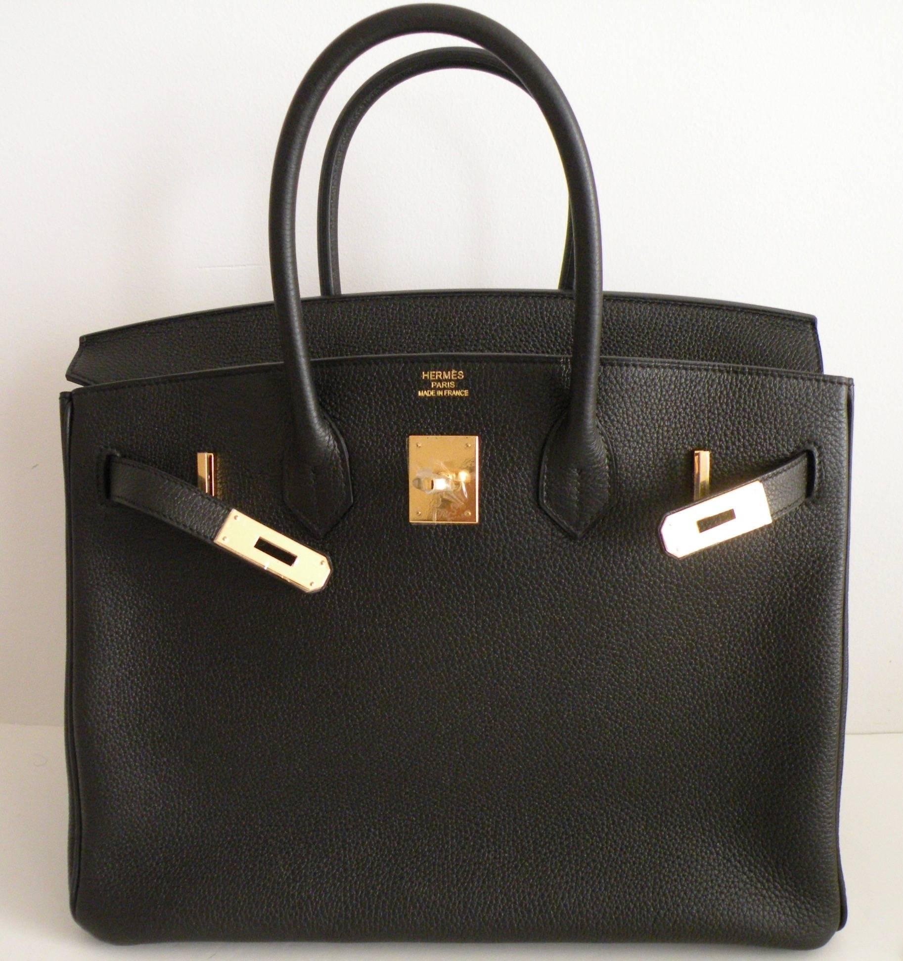 Hermès
35cm Birkin Bag
Black Togo Leather with Gold, probably the most sought after combination in a Birkin. So elegant. Day or Evening
Color: Black
Leather: Togo, a pebbled leather
Hardware: Gold
Lined in Chevre
Brand New never carried
A stamo 2017