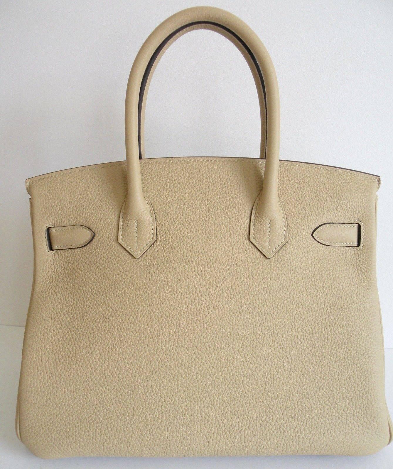 Beautiful New Color from Hermes called Trench.
The color is in the beige family.
This Birkin done in 30cm, has Palladium Hardware and is a fabulous new neutral from Hermes.
Goes with so many different colors, you cant go wrong with this great shade
