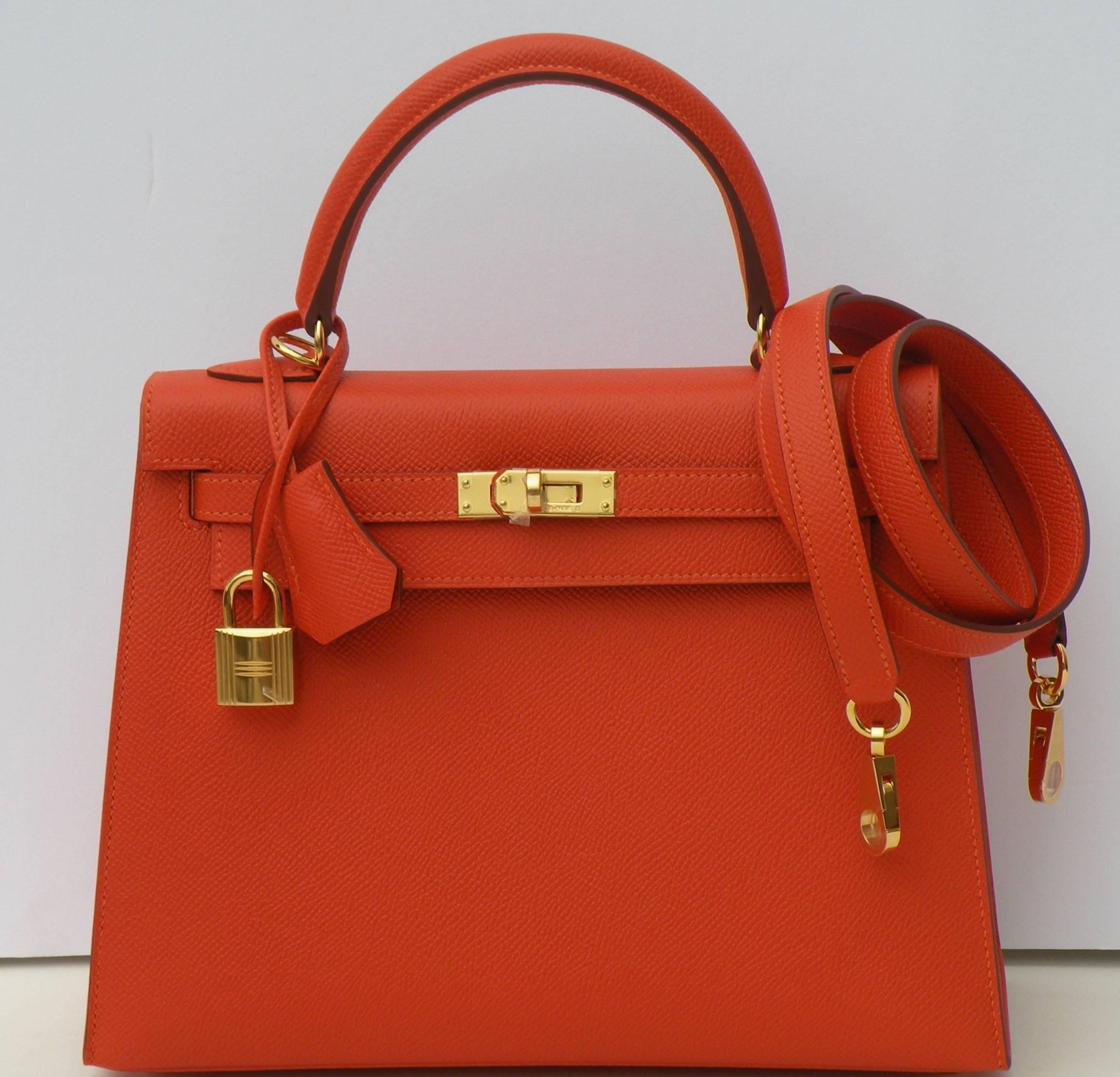 Hermès
25cm Kelly
How can you go wrong with this one!
Small Kelly in RARE size 25
Everyone wants a small Kelly these Days
Sellier Rigid
Orange Feu
Shoulder strap for easy hands free shopping
Leather: Epsom
Hardware: Gold

Lined in Chevre

Stamp: X

