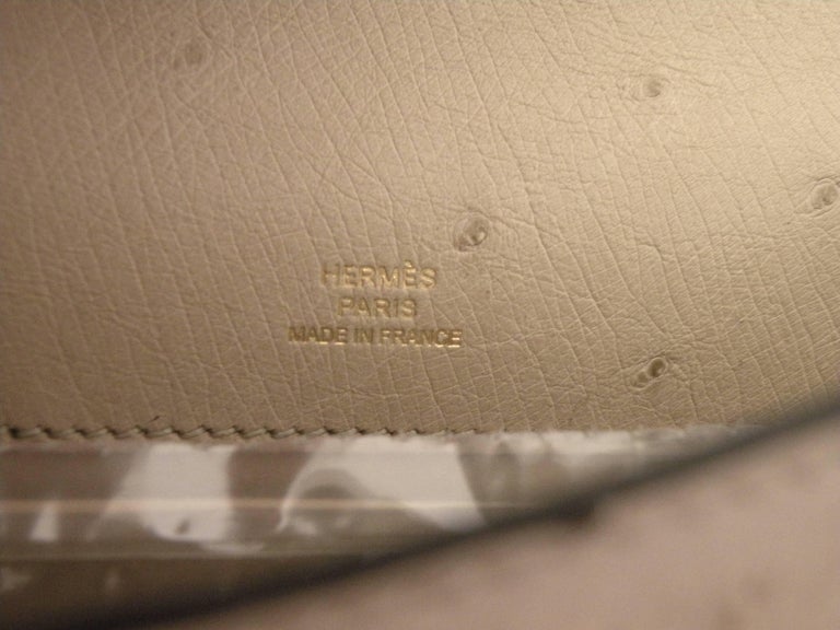 HERMÈS KELLY POCHETTE PARCHEMIN Ostrich Leather with Gold Hardware