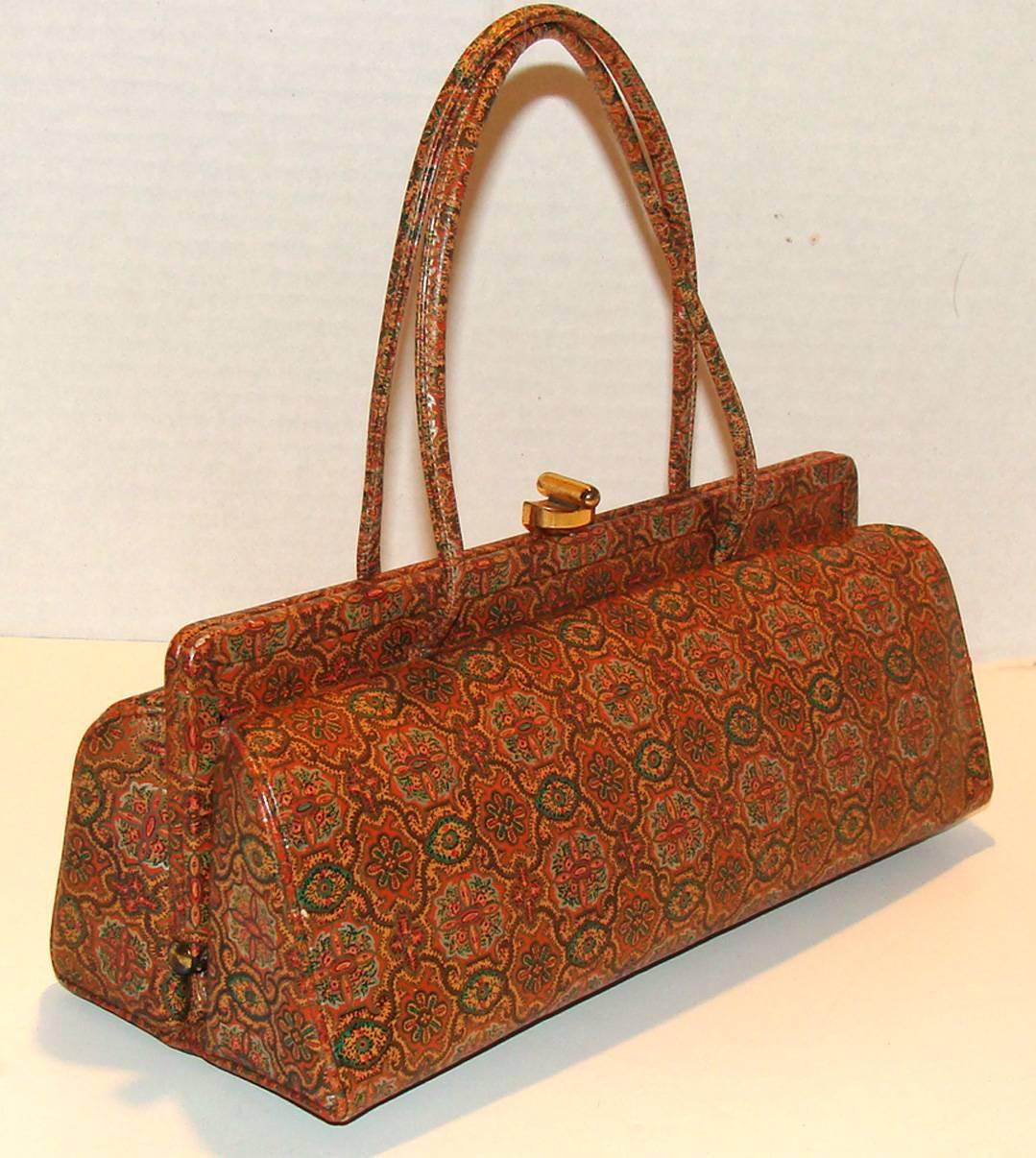 This bag is part of a large consignment from one of our long-time collectors who is downsizing.  For years she was one of the most successful women in the United States.  She ignored the glass ceiling and was never held back, she continued to push