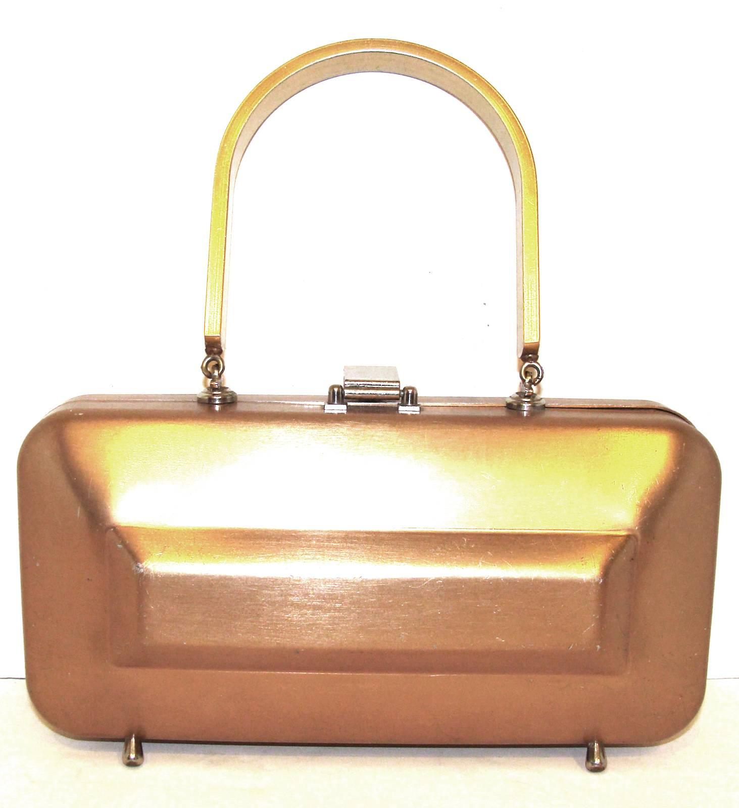 This is a sought after example for vintage bag collectors.  

This piece is a consignment from a longtime collector.  She is downsizing and has given us a great collection of iconic pieces to offer in our gallery.  This is the first one we are