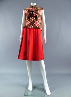 Pierre Balmain red Silk jacket and pleated skirt suit Ensemble, Circa 1965-1970