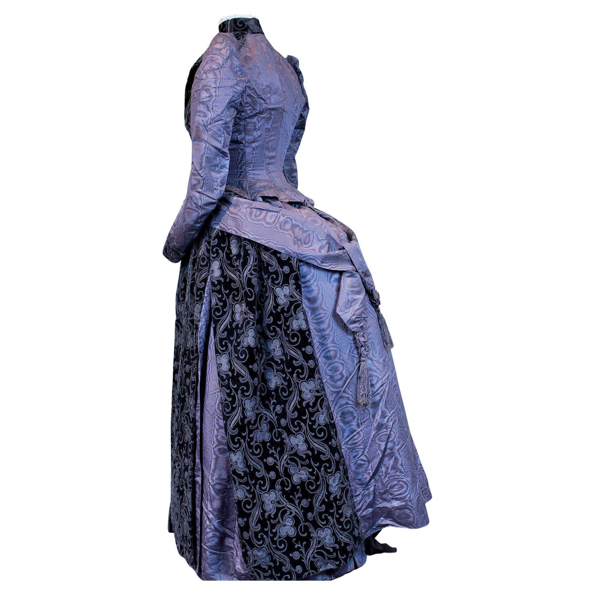A French bustle cage day Dress in silk moire and purple chiseled velvet C. 1885