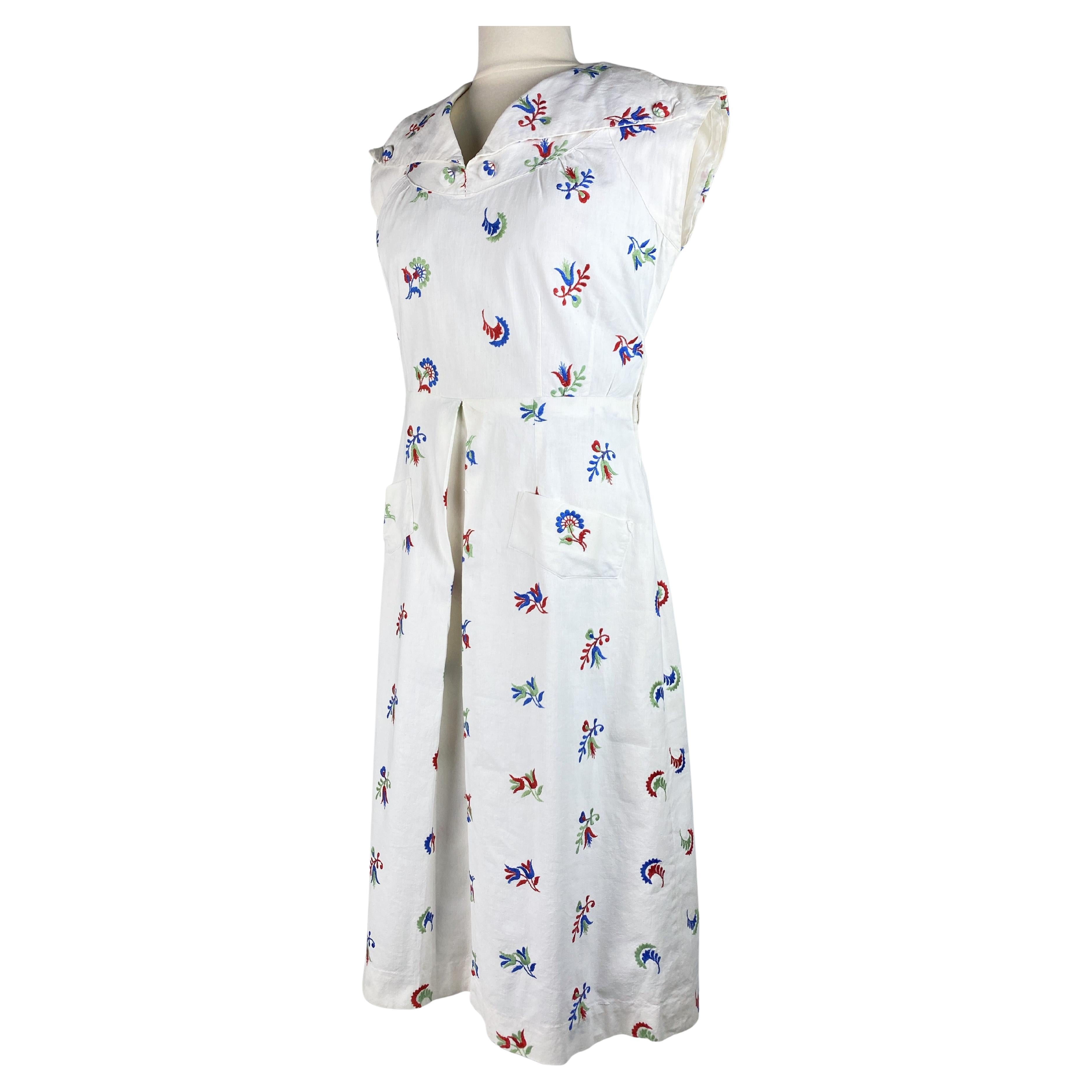 A patriotic embroidered dress dating from the Liberation of France Circa 1945 For Sale