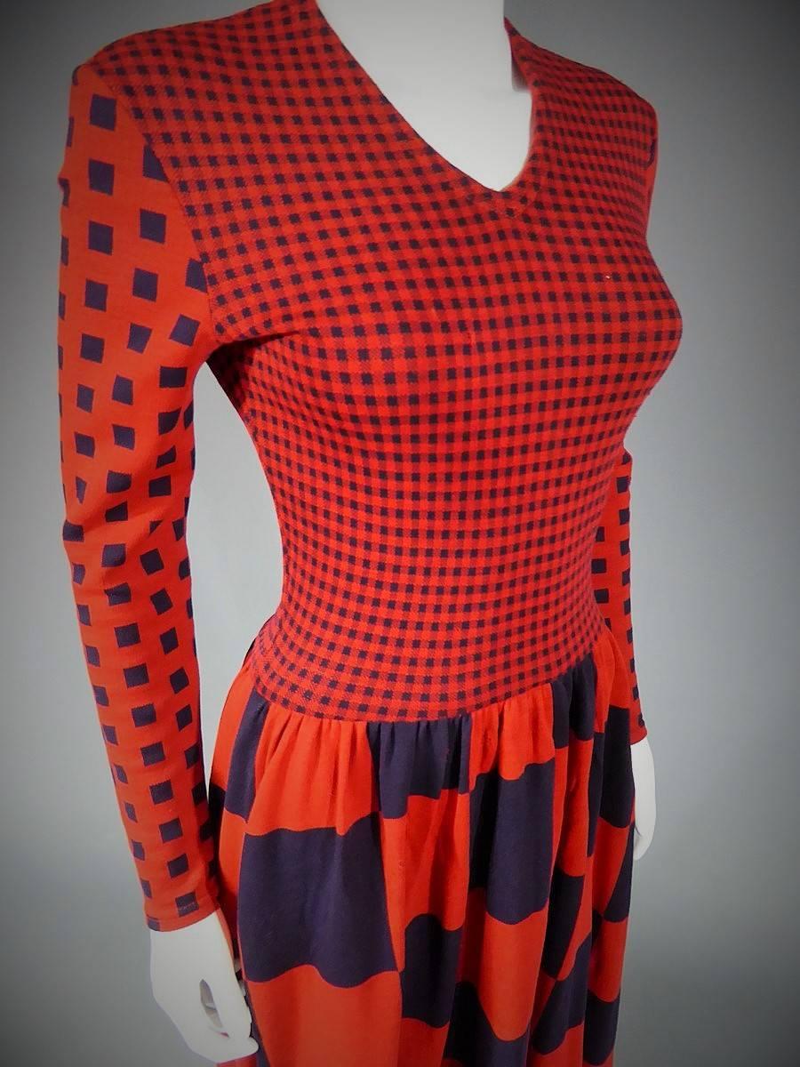Circa 1970/1975

United States

An American Couture dress by Rudi Gernreich designed for Harmon knitwear. Op' Art effect (equivalent in France is artist Vasarely). 100% wool knit with variation of checkered optical effect in red and black... Long