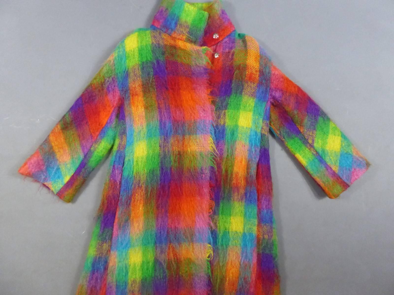 France

JC de Castelbajac labelled coat size 42 of the 80s. Fluffy wool of a polychrome plaid pattern. Perfect condition.

French Size 42
Jean-Charles de Castelbajac is known for his eccentric