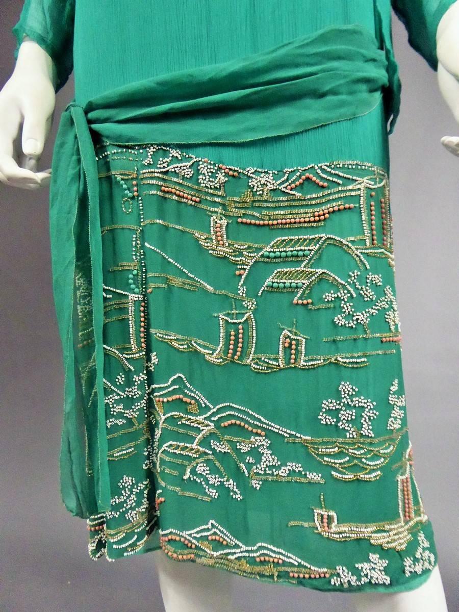 France Haute Couture

Japanese-style Circa 1925 
Silk crepe dress elegantly tied on the hips and dating from the Art Deco Period. Sleeveless dress in taffetas and green water / turquoise muslin. Matching dress with long sleeves and two scarves.