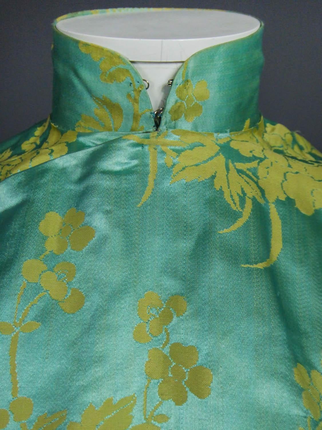 Women's Chinese Qipao in sky-blue and straw-yellow silk damask, Circa 1950