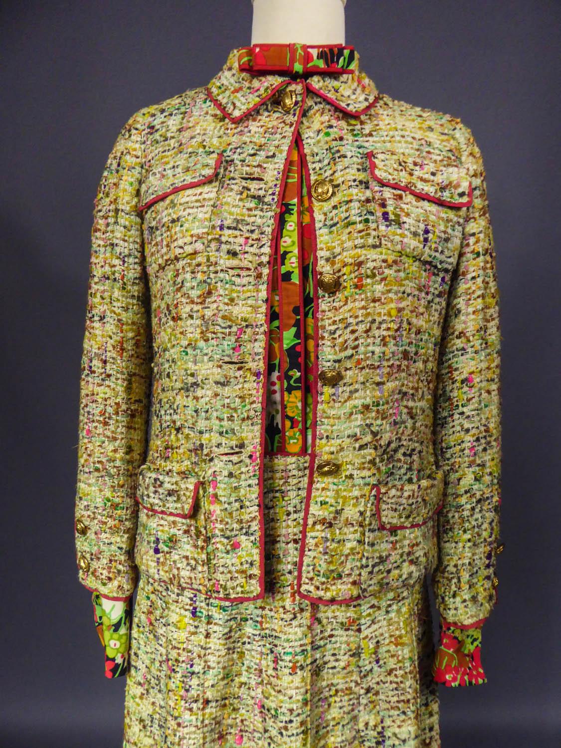 Circa 1968/1971
France

Famous and amazing Haute Couture skirt and blouse suit by Gabrielle Chanel dating from the last years of the famous icon of French fashion before 1971. Skirt and jacket in flecked wool tweed in shades of beige, yellow, green,