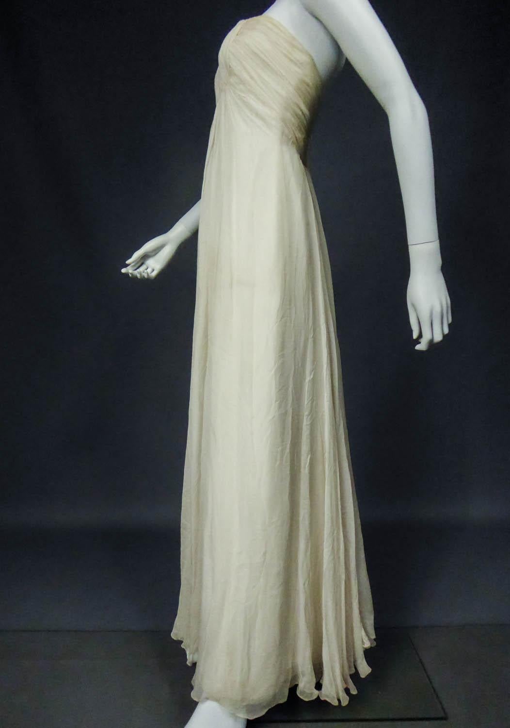 A French Couture Chiffon Cream Evening Dress Circa 1970 For Sale 2