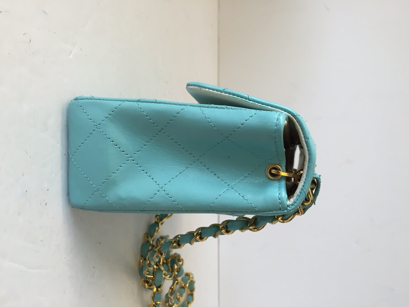 Brand: Chanel
Manufactured: France 
Color: Tiffany Blue 
Size: Small
Year: 1987

Bag Length: 6.5