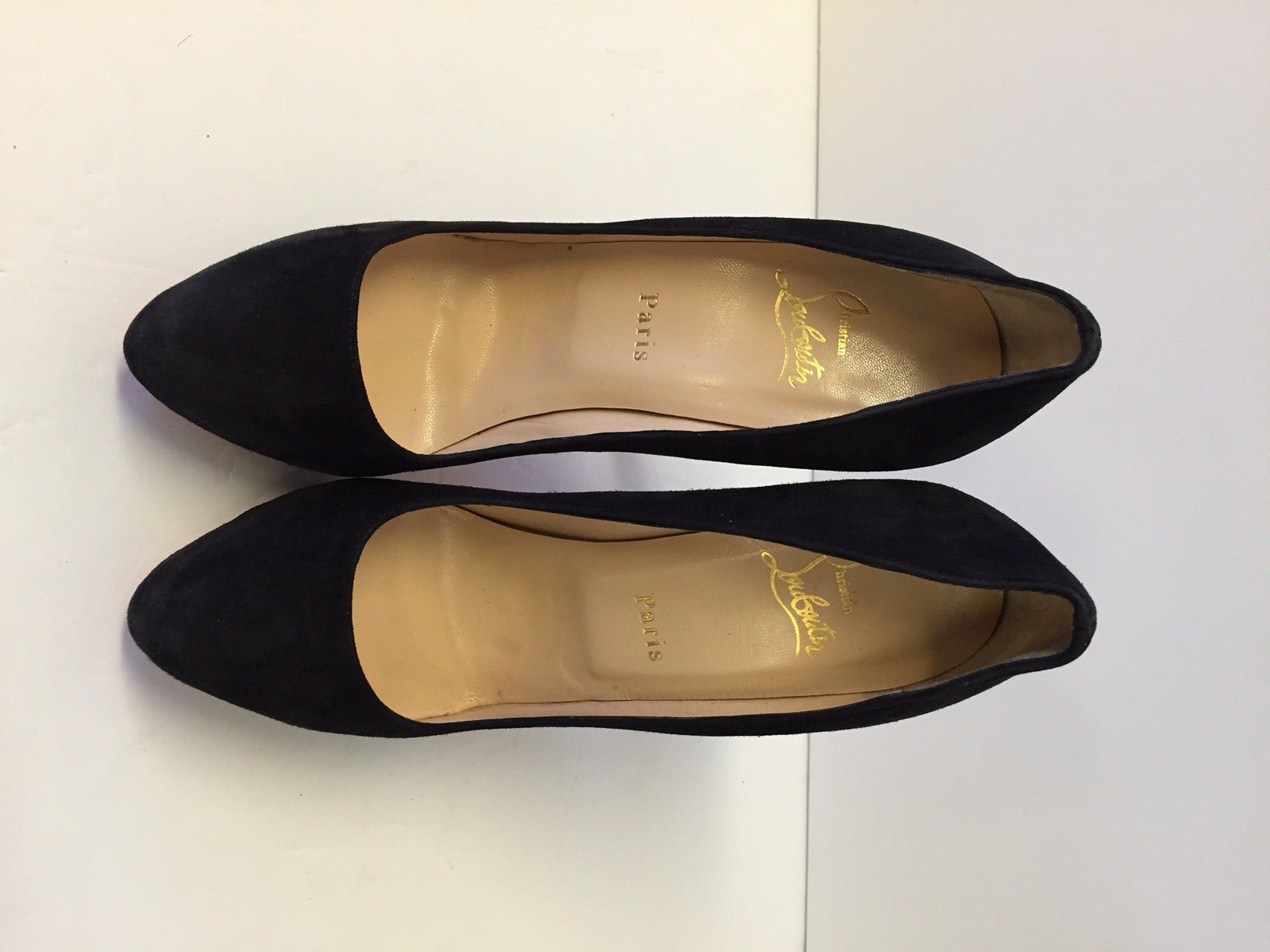 Sleek almond toe frames low-cut vamp.
5 1/2