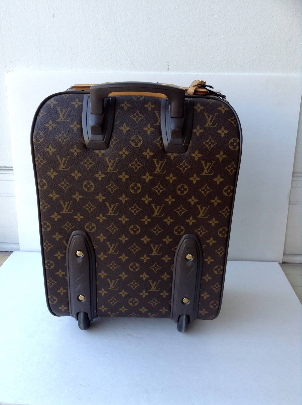 Women's or Men's Louis Vuitton Pegase 45 Monogram Rolling Travel Bag Suitcase For Sale