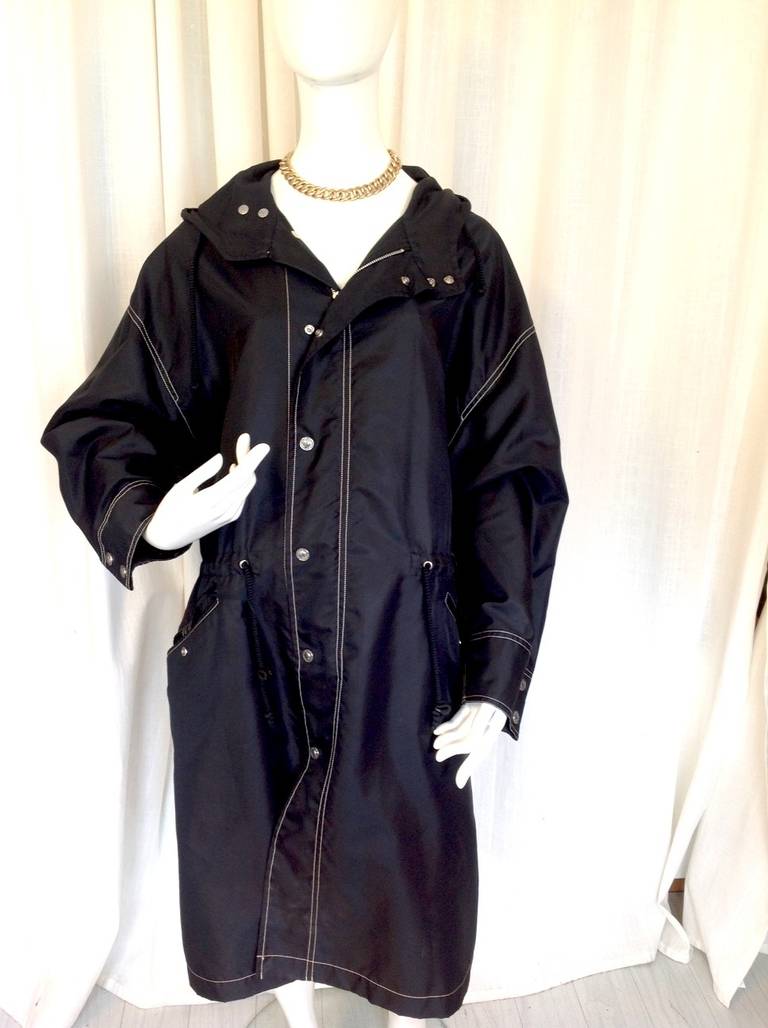 Absolutely gorgeous vintage Chanel rain coat that can be worn completely unisex! Both practical and stylish, Chanel was truly on the mark with the creation of this beautiful piece!

Brand: Chanel
Made in: Unknown (Does not Specify France or