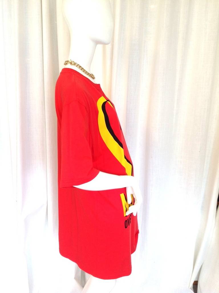 Completely brand new with tags still attached! From the recent Moschino collection inspired by McDonalds, this collector's piece is a must have!

Brand: Moschino
Made in: Italy
Material: 100% Cotton
Condition: New (10/10 with tags)
Size: M