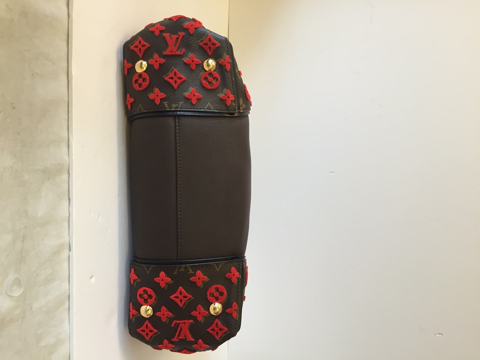 Women's Louis Vuitton W PM Bag in Brown with Red For Sale